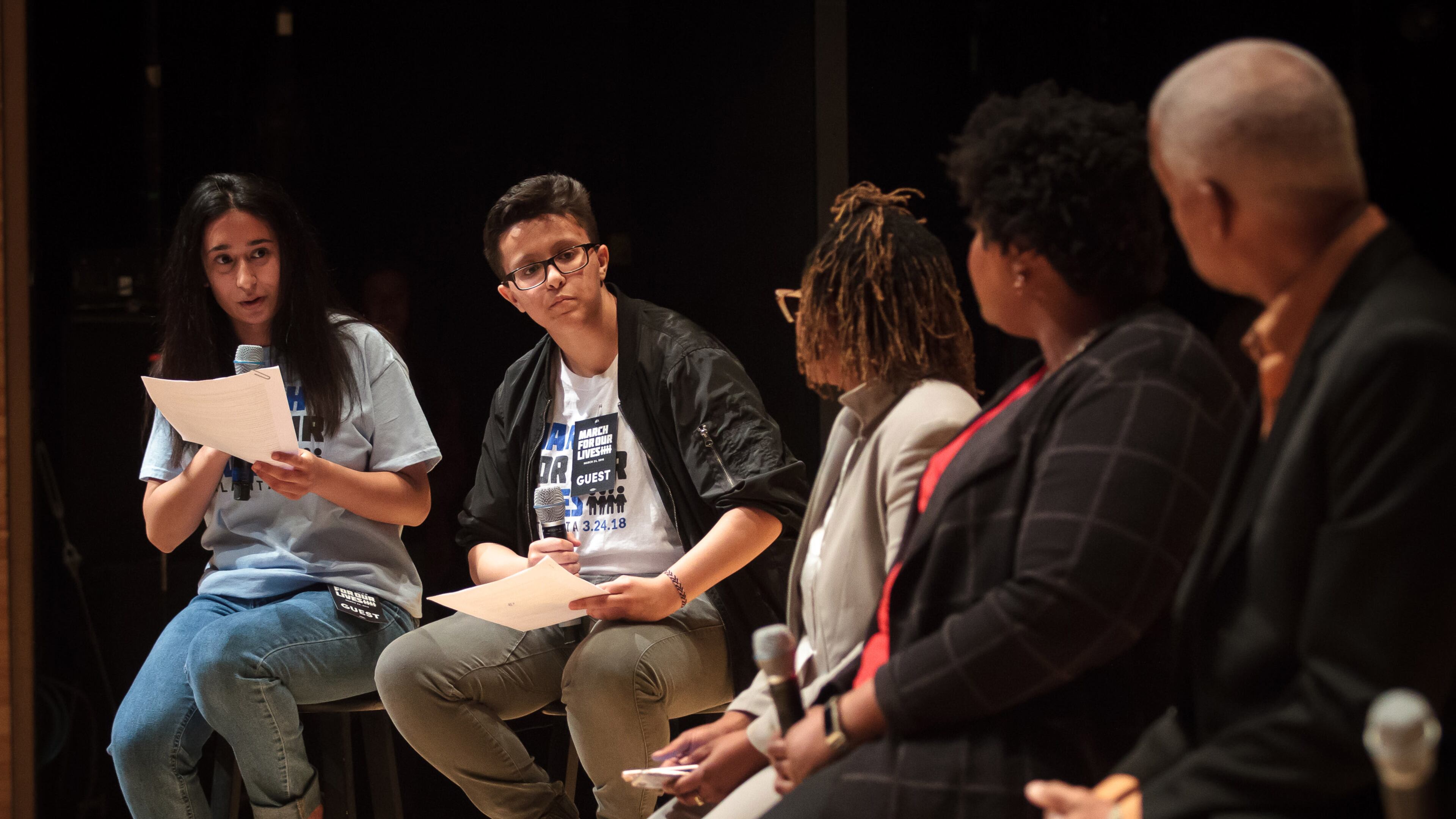 High school students Anam Hussain (left) and Joey Lopez direct questions to a panel of speakers during the Town Hall For Our Lives at the Rialto Center for the Arts in Atlanta on Saturday, April 7, 2018. STEVE SCHAEFER / SPECIAL TO THE AJC