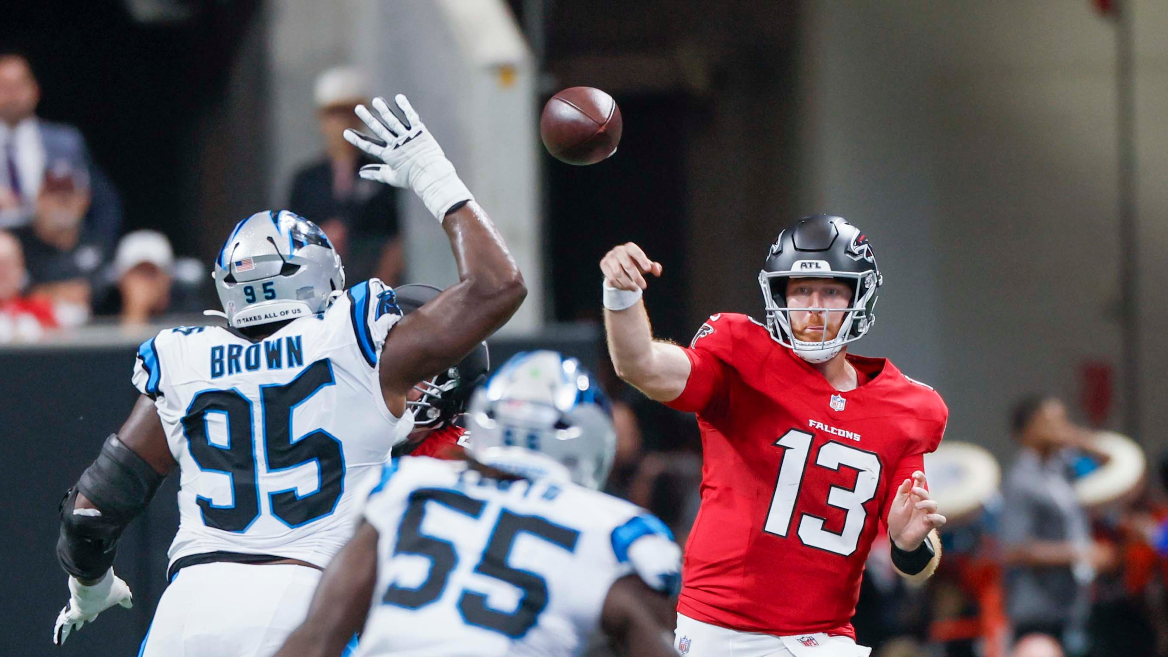 Atlanta Falcons quarterback Cooper Rush attempts a pass in the first half of an NFL game against the Carolina Panthers at Mercedes-Benz Stadium in Atlanta on Sunday, September 20, 2026. (Miguel Martinez/AJC)