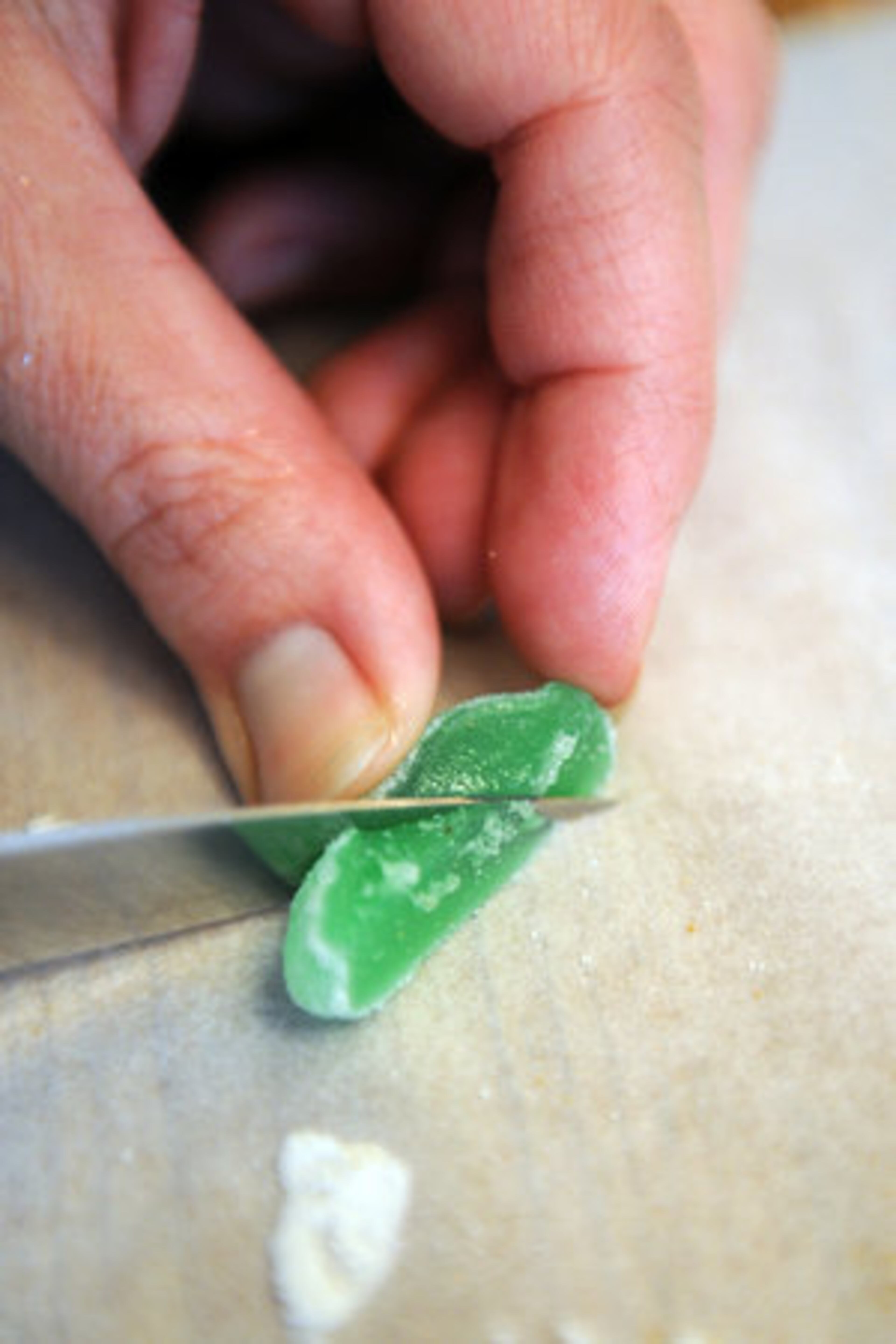 3. To make a festive window, cut leaf-shaped spearmint jellies in half, then apply red dragees (available at craft or cake supply stores including Cake Art in Tucker) for a holly-and-ivy look. HYOSUB SHIN / HSHIN@AJC.COM