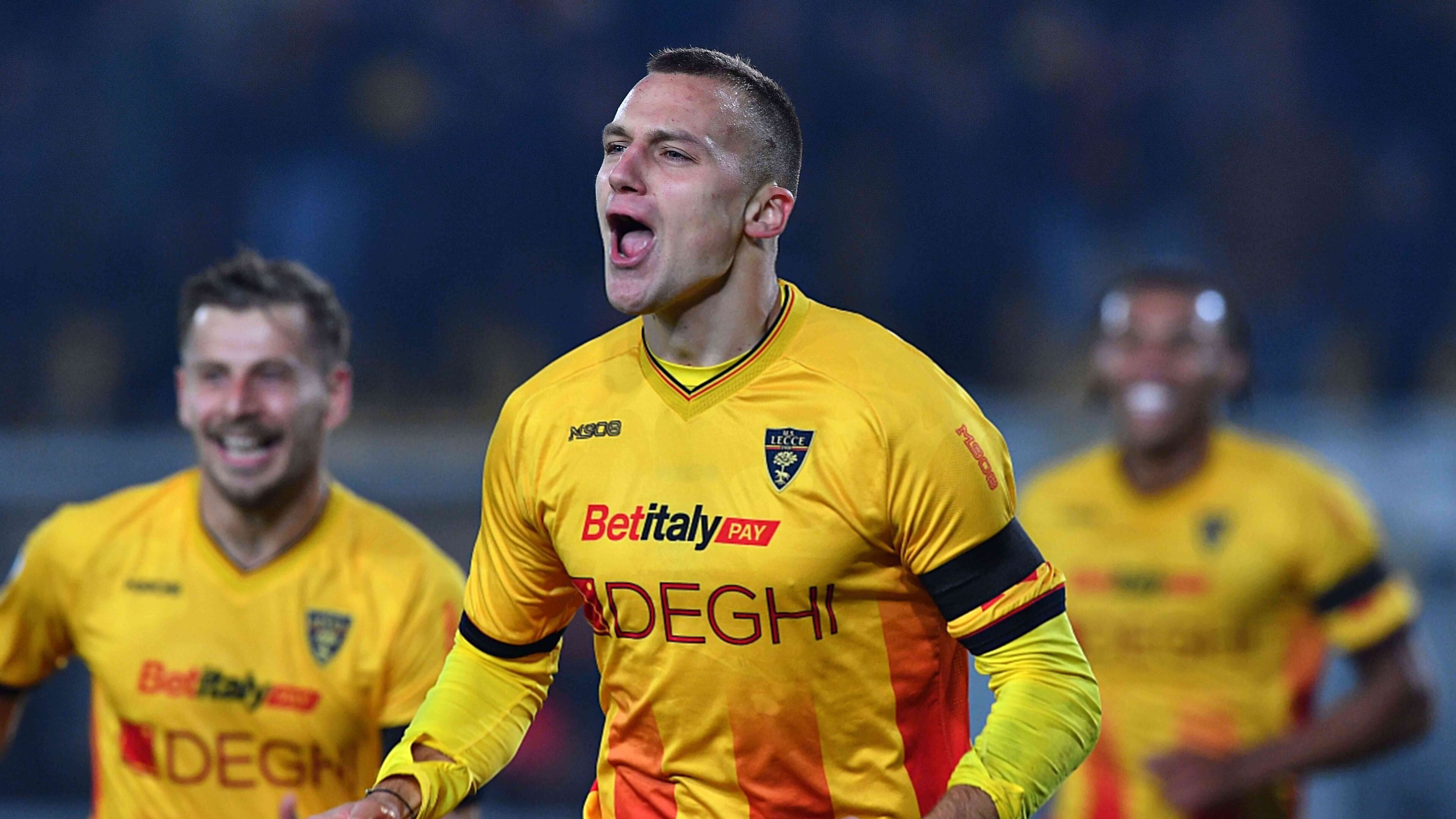 Lecce's Nikola Štulić (9) celebrates after scoring the team's first goal during a Serie A soccer match between US Lecce and Pisa Sportin Club 1909, Friday, Dec. 12, 2025, in Lecce, Italy. (Giovanni Evangelista/LaPresse via AP)