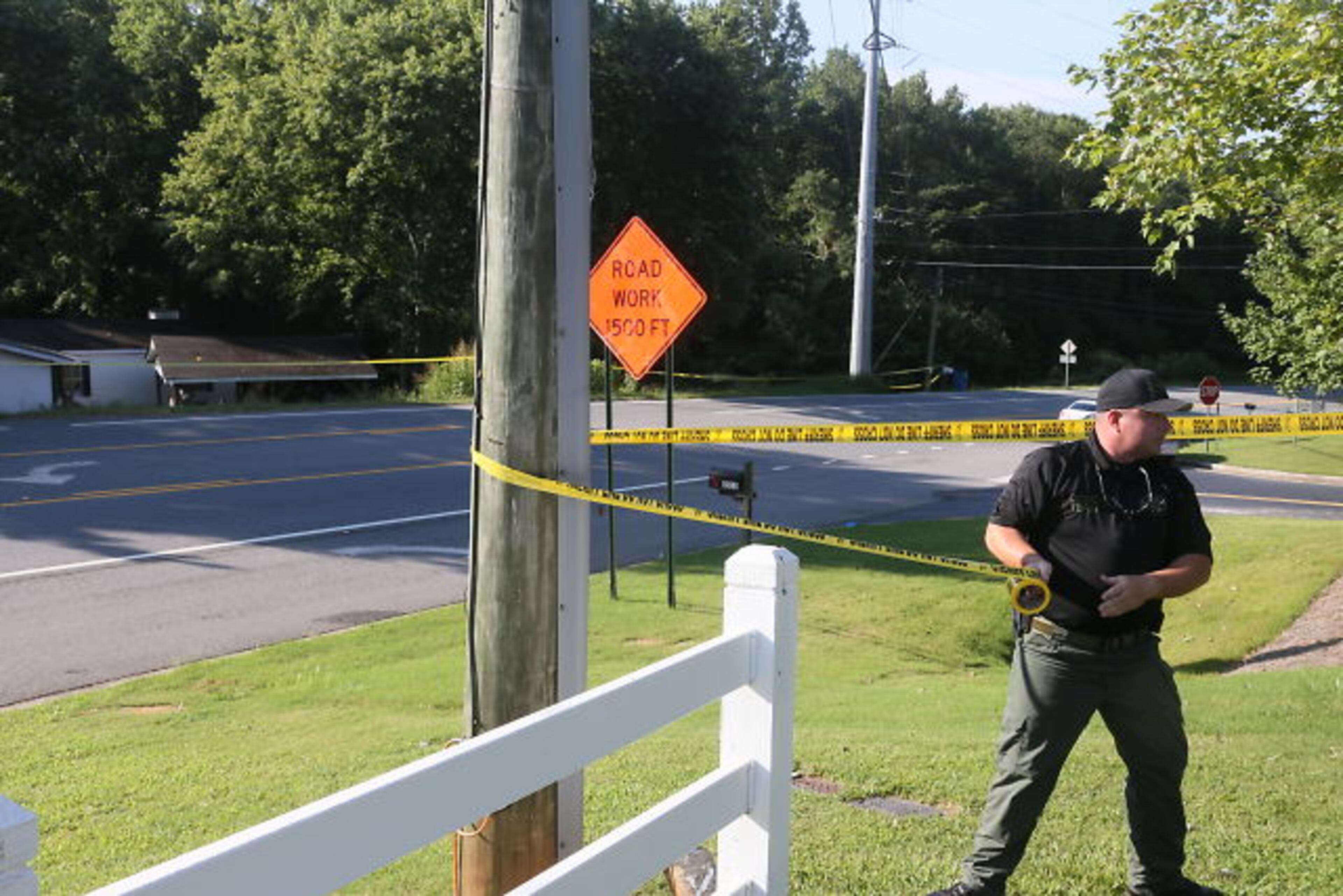 Forsyth sheriff’s Deputy Robin Regan confirmed four people died Wed., July 22, 2015, in a murder-suicide in the 5500 block of Old Atlanta Road. BOB ANDRES / BANDRES@AJC.COM
