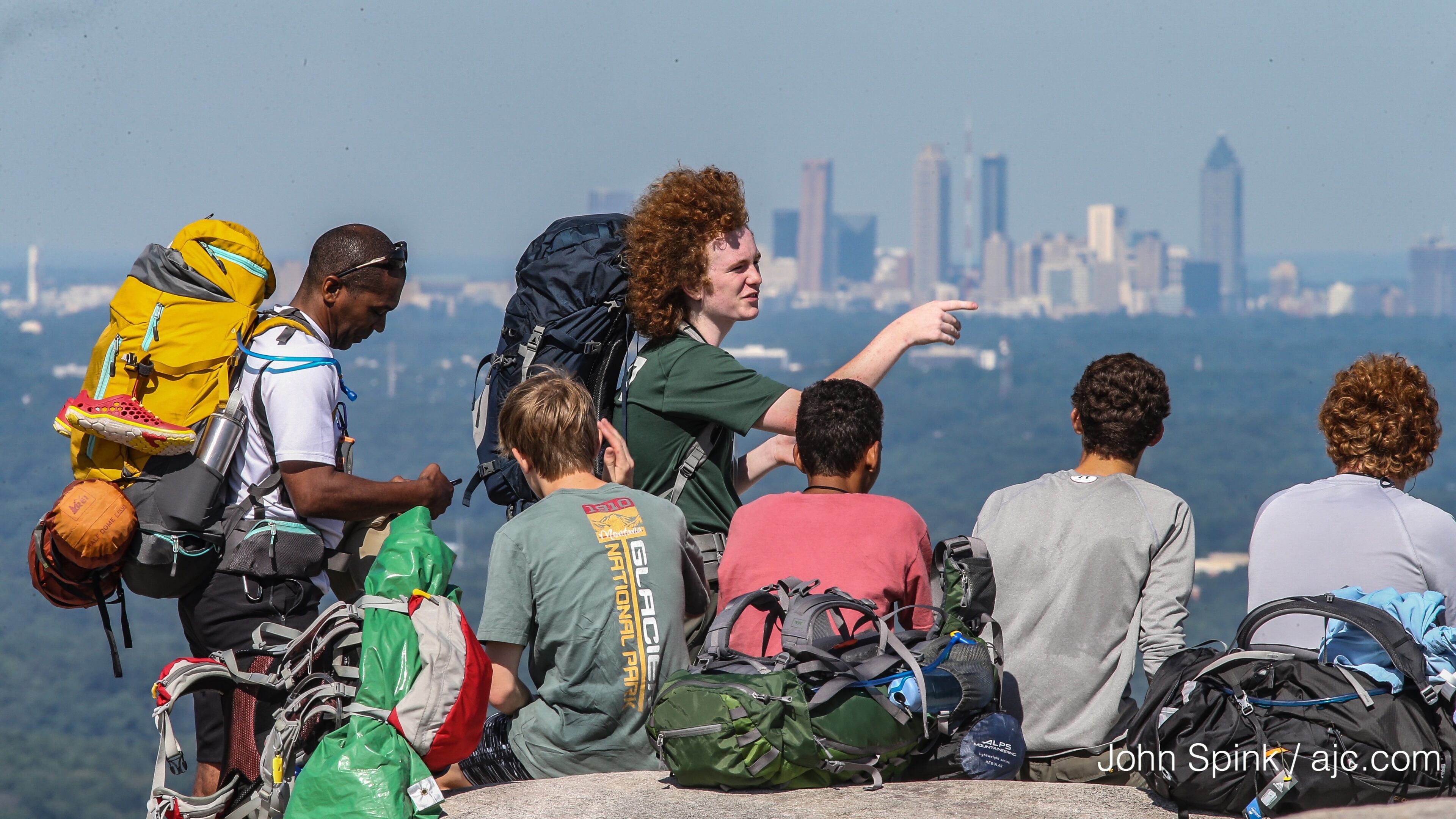Boy Scout Troop 477 from Dunwoody took advantage of the pleasant weather on a hike up Stone Mountain on Tuesday. JOHN SPINK / JSPINK@AJC.COM