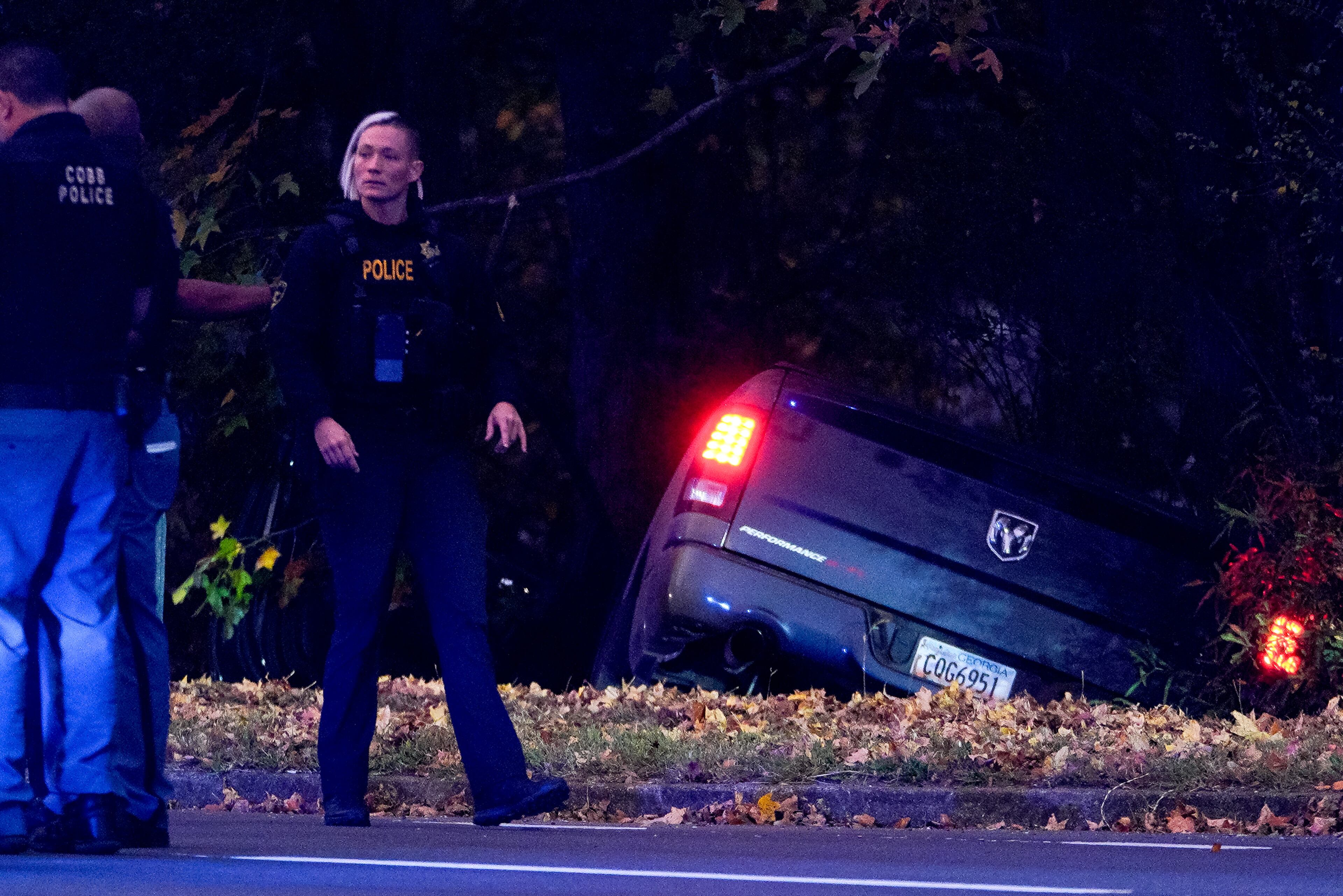 A vehicle went off the road Wednesday evening during an officer-involved shooting in Cobb County.