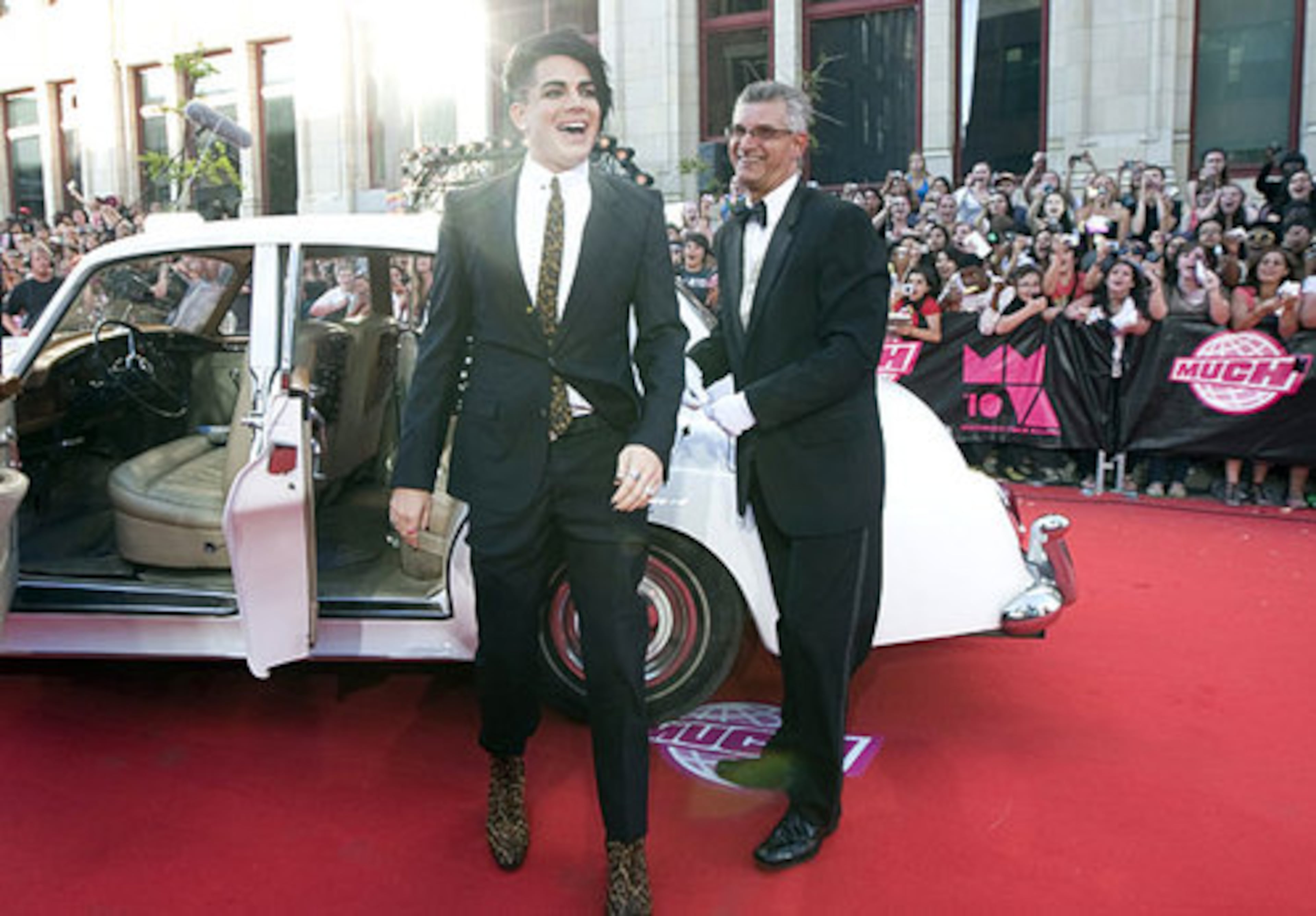 Adam Lambert arrives.