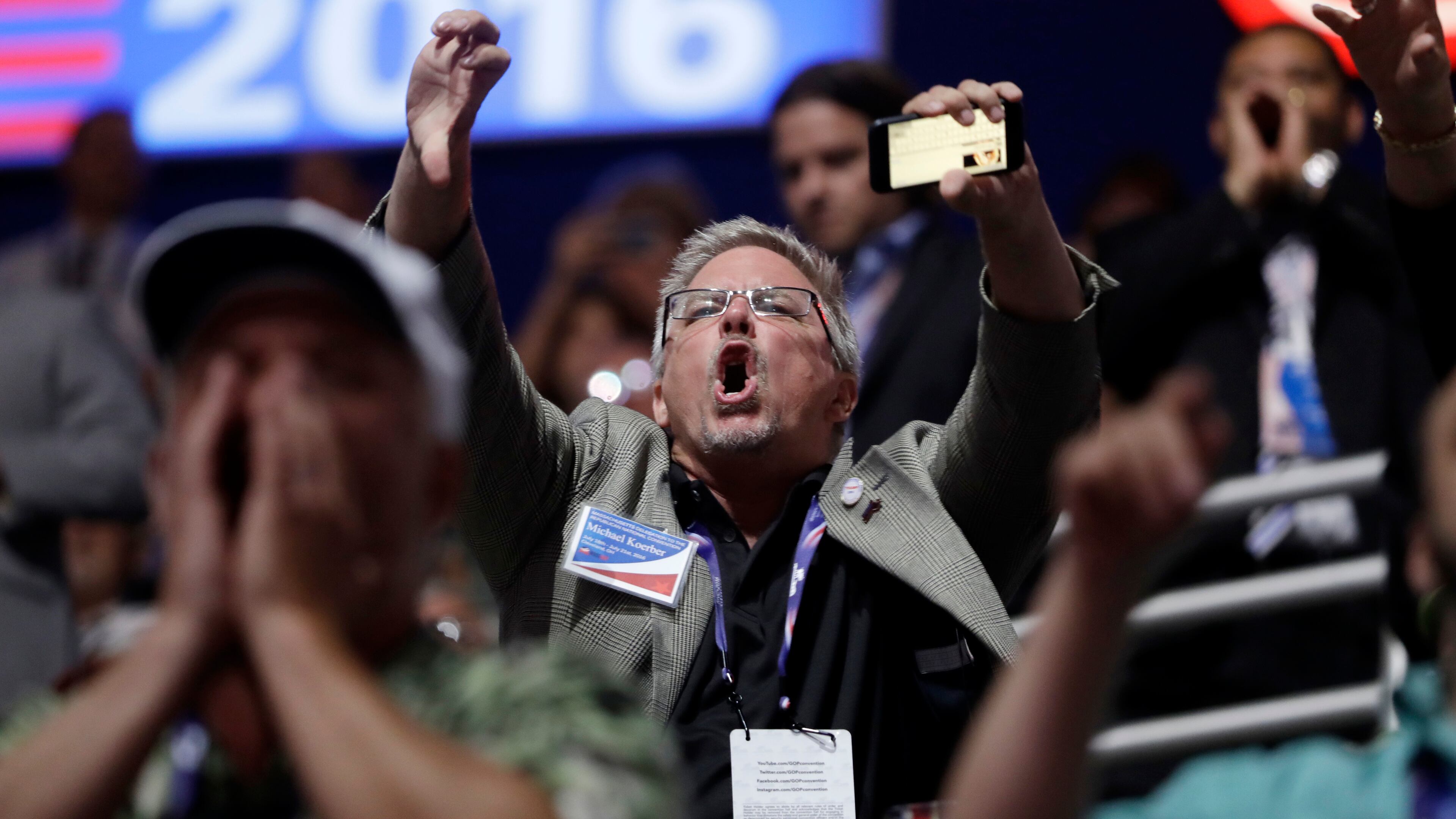 People react to Sen. Ted Cruz, R-Tex., as Cruz addresses the delegate during the third day session of the Republican National Convention in Cleveland, Wednesday, July 20, 2016. (AP Photo/Matt Rourke)