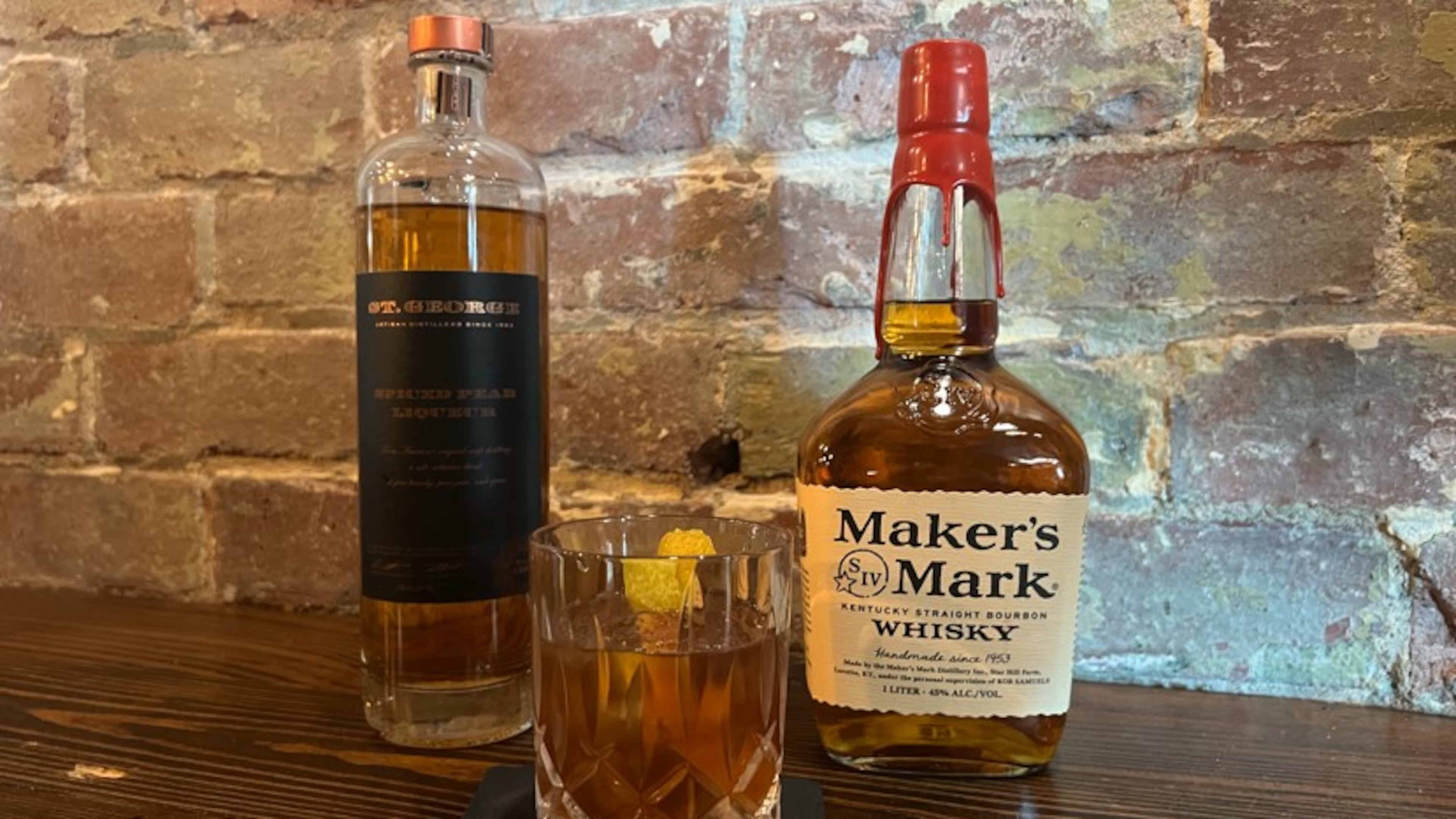 A hillbilly hymn cocktail, made with pawpaws and Maker's Mark, is perfect for fall. (Krista Slater for The Atlanta Journal-Constitution)