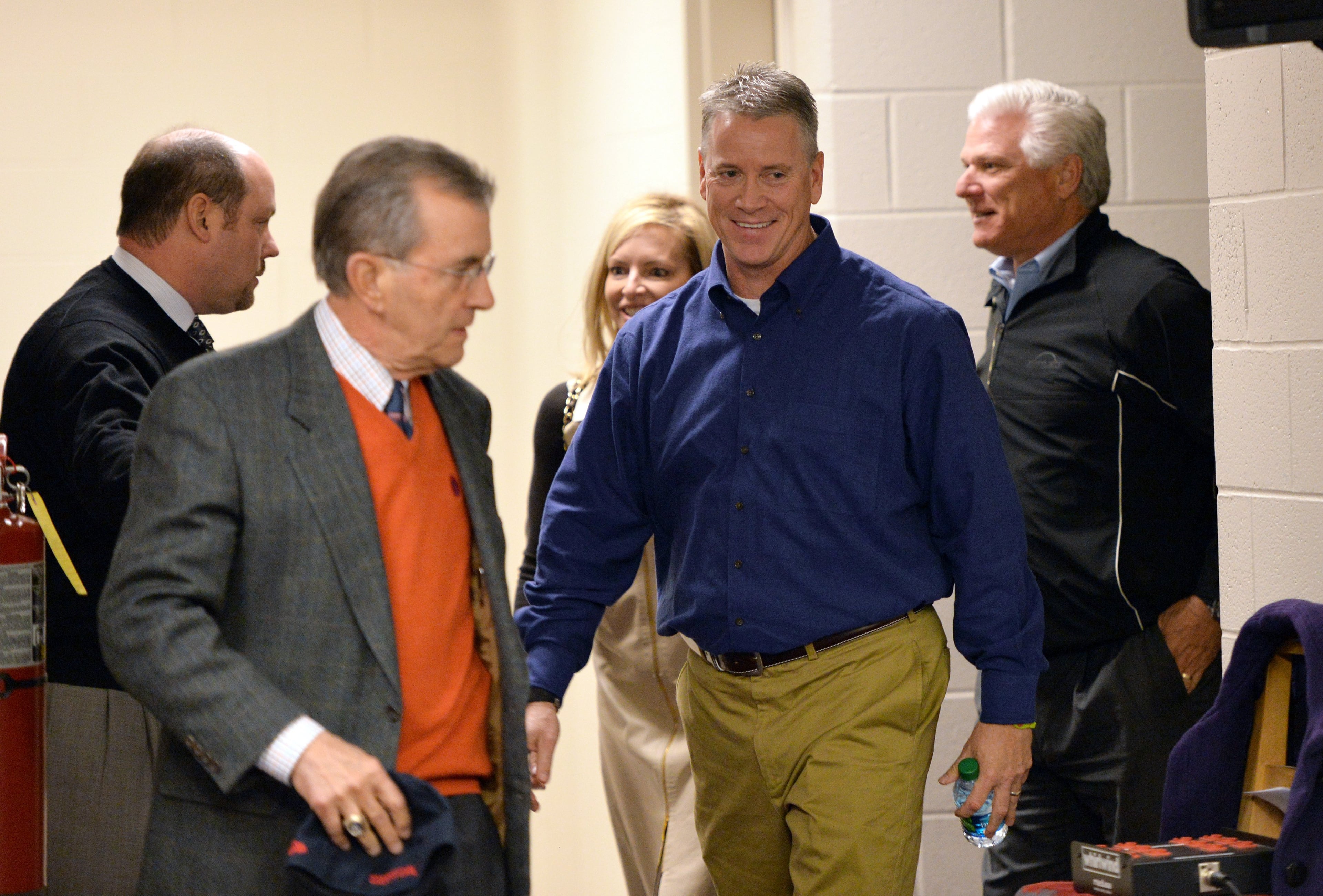 Former Braves pitcher Tom Glavine (center) walks in for a news conference at Turner Field on Wednesday, January 8 , 2014. Former Braves pitchers Greg Maddux and Tom Glavine to join former manager Bobby Cox. Greg Maddux had 97.2 percent of the vote, Tom Glavine garnered 91.9 percent.