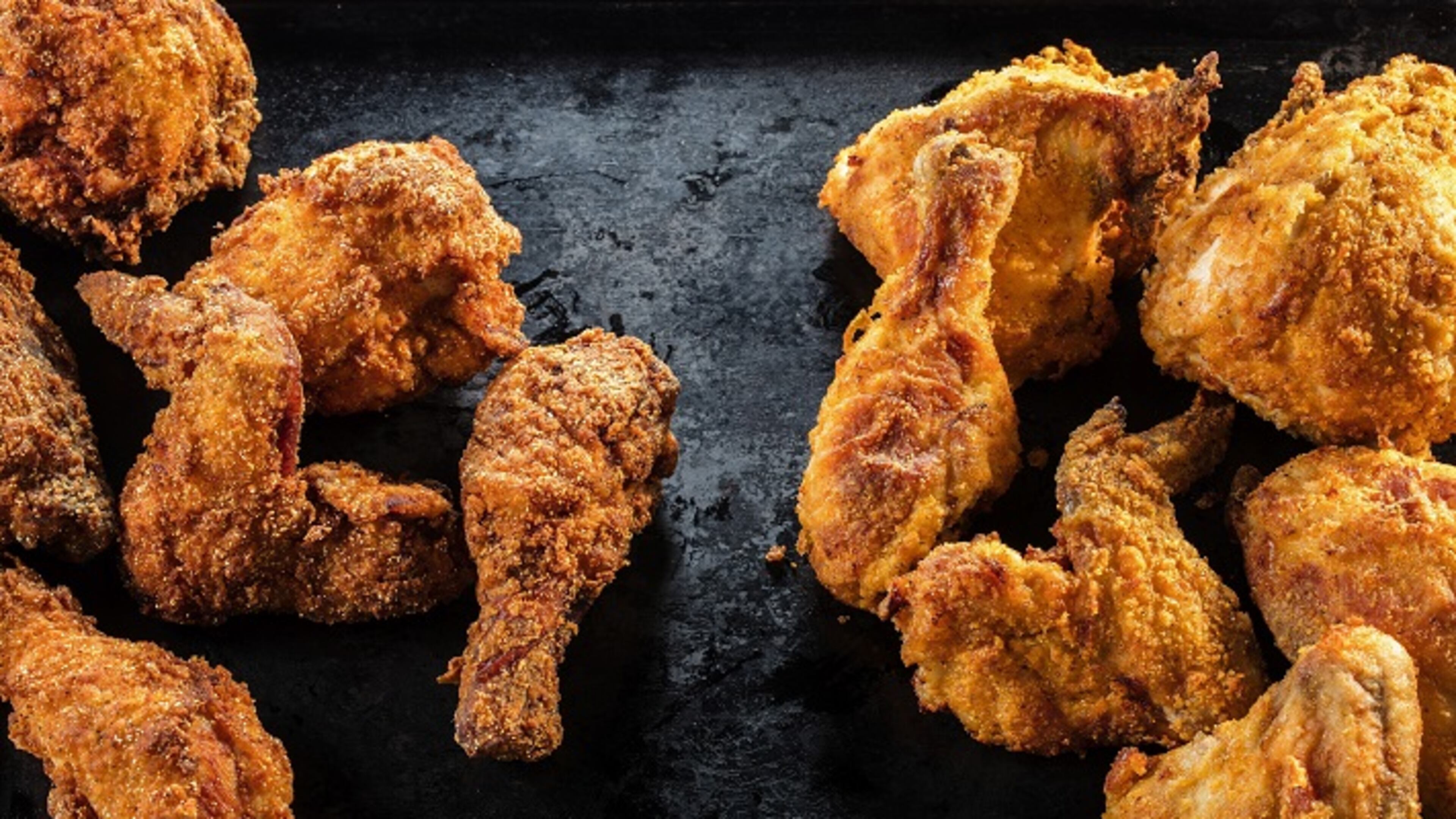 Tasters in the Tribune test kitchen found the chicken fried in oil in a skillet, left, more crispy than pieces cooked in an air fryer, right. But some tasters found the air fried more juicy. (Zbigniew Bzdak/Chicago Tribune/TNS)