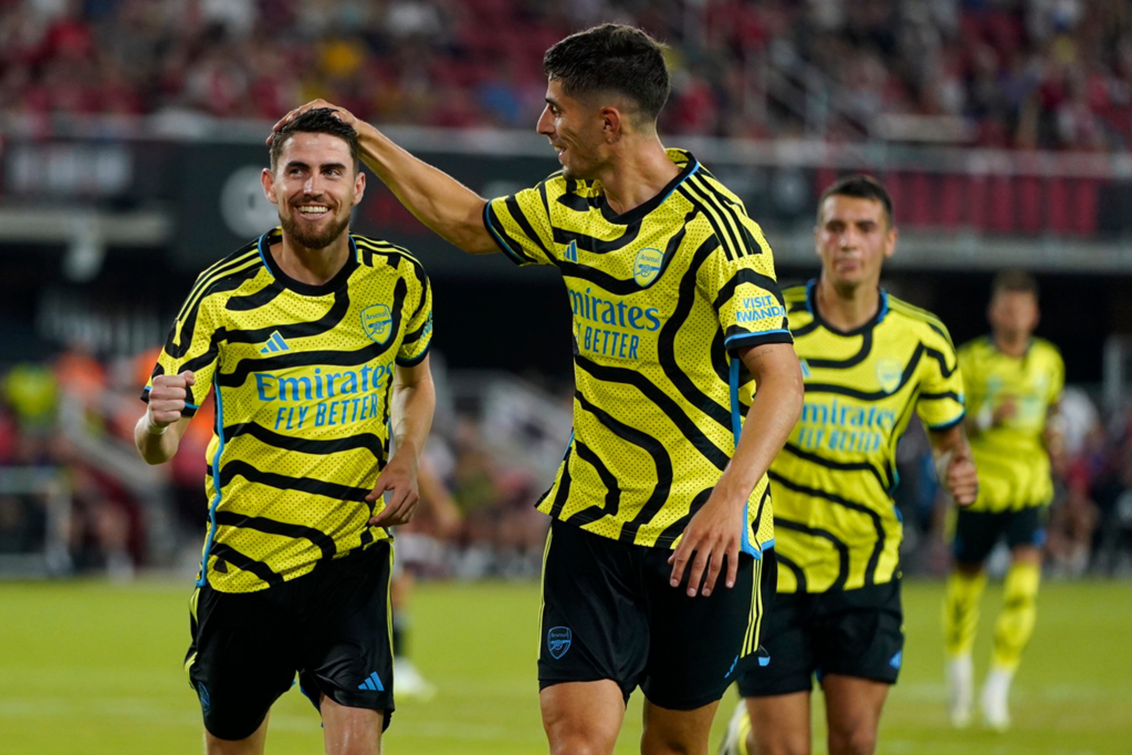 Arsenal midfielder Jorginho, left, celebrates his penalty kick with teammate Kai Havertz in the second half of the MLS All-Star soccer match against the MLS All-Stars, Wednesday, July 19, 2023, in Washington. (AP Photo/Alex Brandon)