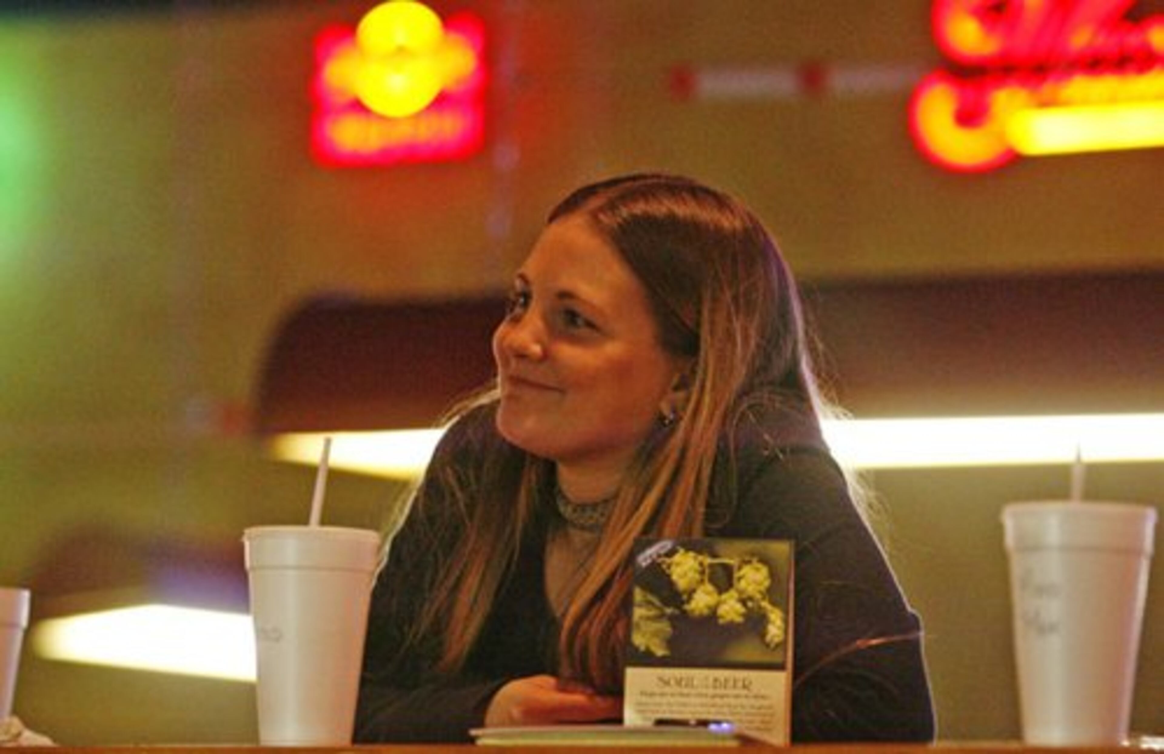 Waitress Brittany Schneider, 23, hangs out with some of the regulars. Many of them got hugs.