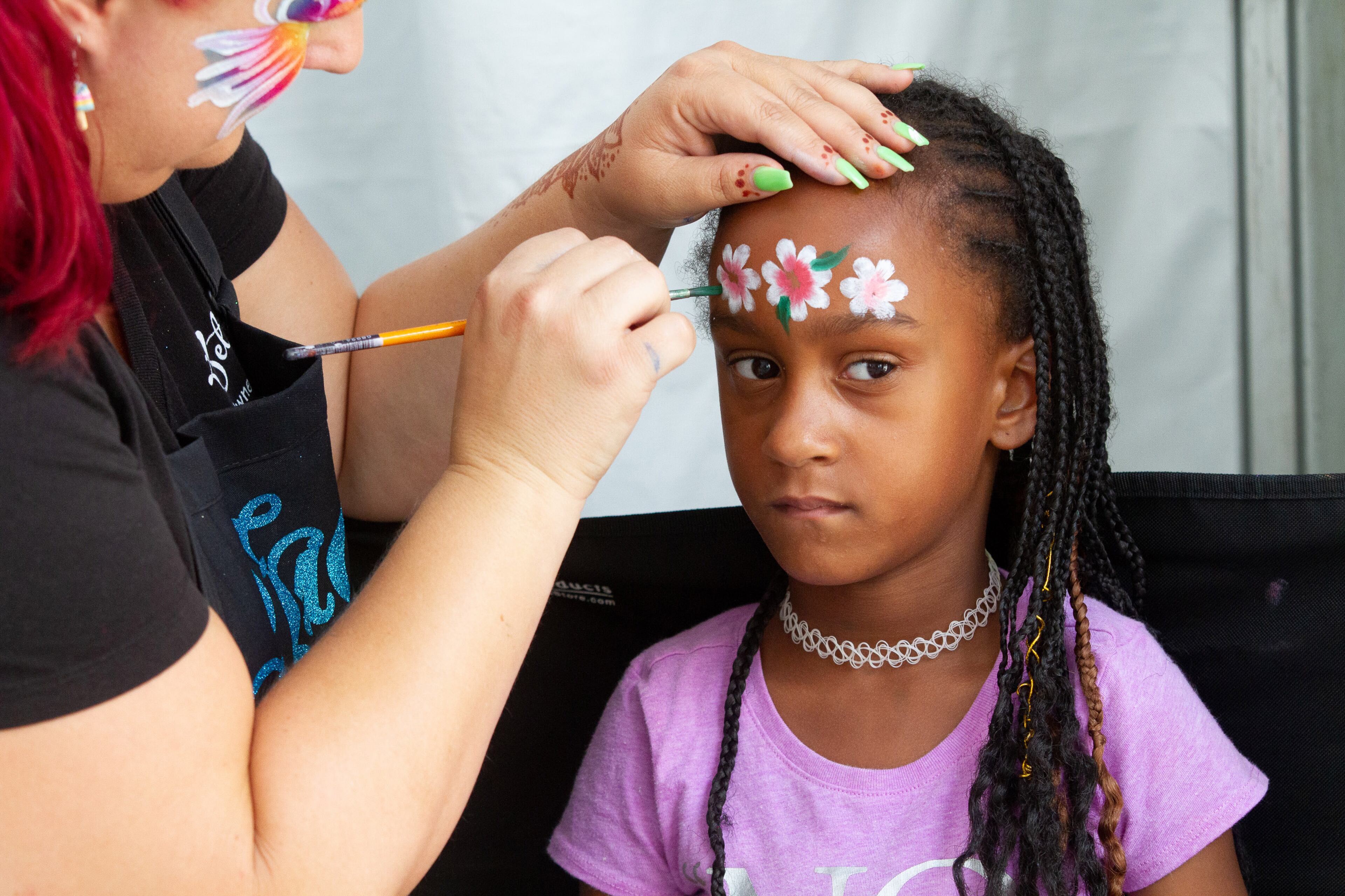 Shaila Walker, 7, gets her face painted during the AJC Decatur Book Festival on Sunday, September 1, 2019. STEVE SCHAEFER / SPECIAL TO THE AJC
