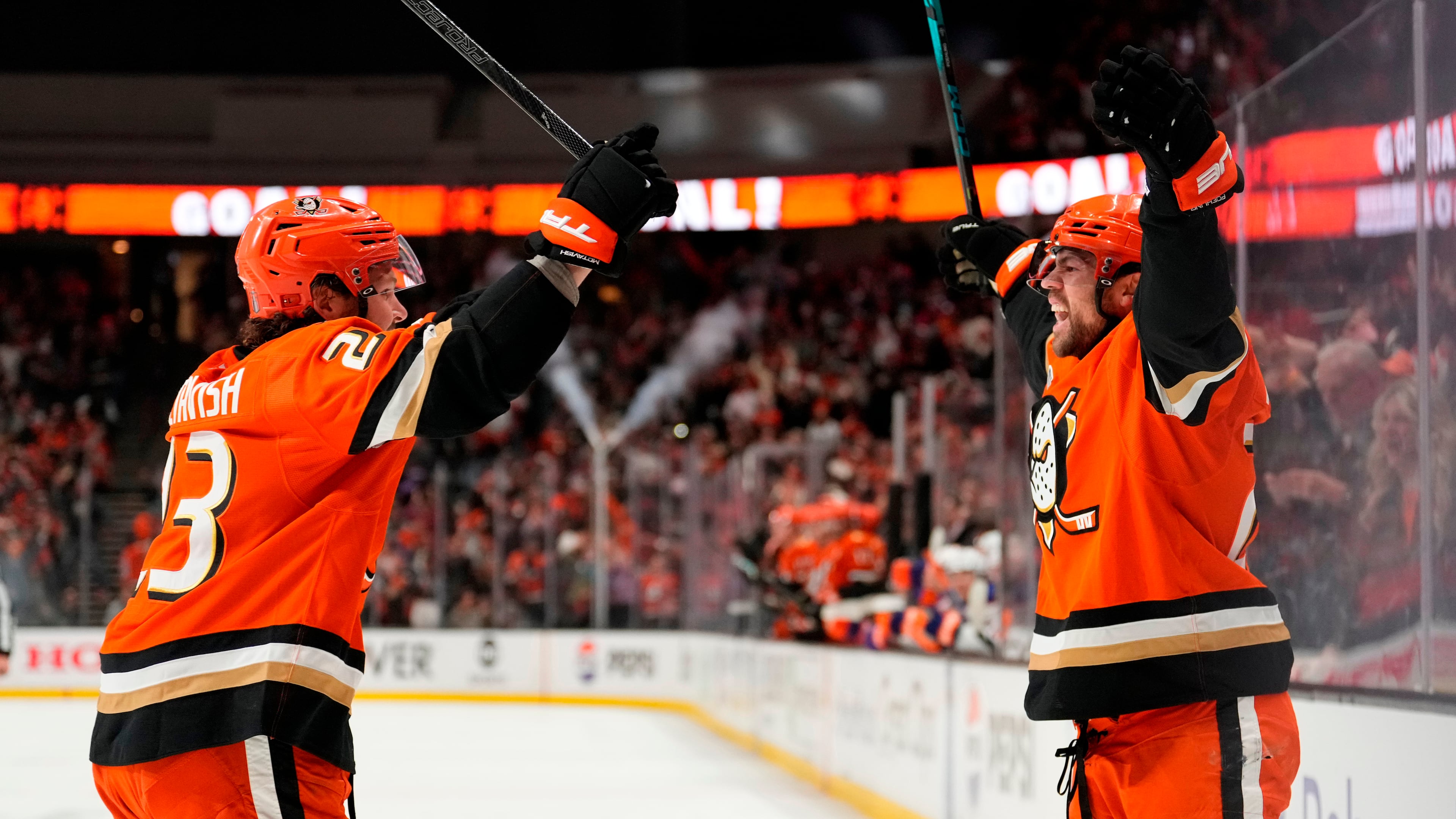 Anaheim Ducks center Ryan Poehling, right, celebrates his goal with center Mason McTavish during the first period of Game 6 in the first round of the NHL hockey Stanley Cup playoffs series against the Edmonton Oilers, Thursday, April 30, 2026, in Anaheim, Calif. (AP Photo/Mark J. Terrill)
