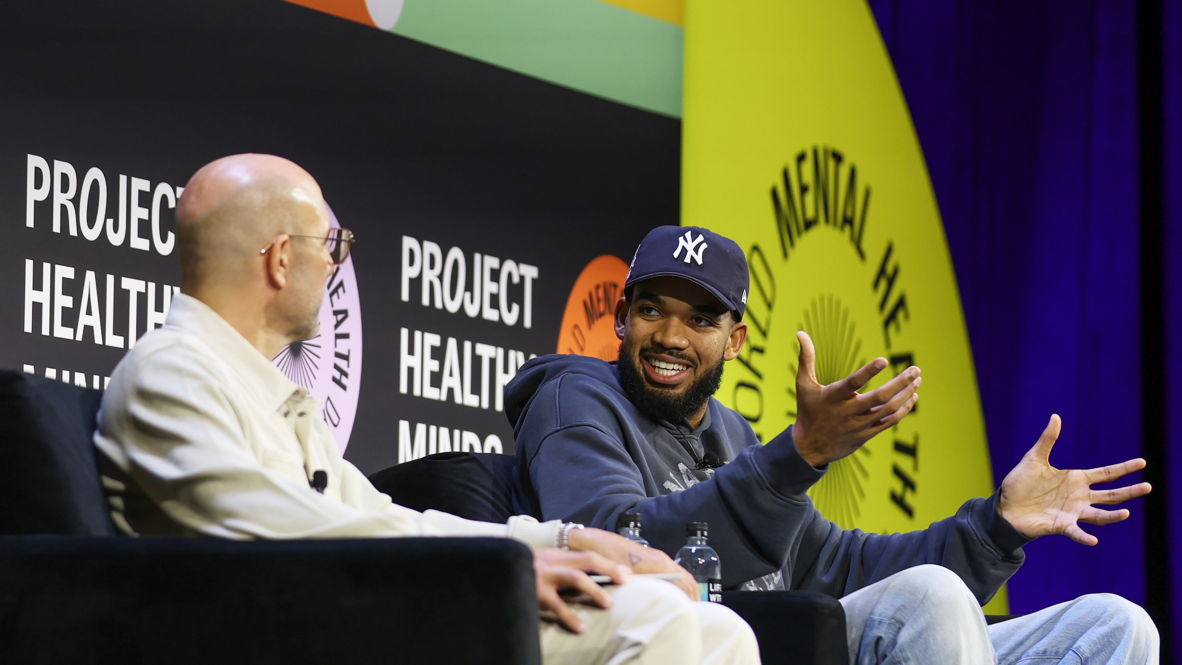 NBA player Karl-Anthony Towns of the New York Knicks sits for a discussion with Rich Kleiman at the Project Healthy Minds World Mental Health Day Festival, Saturday, Oct. 10, 2026, in New York. (AP Photo/Heather Khalifa)