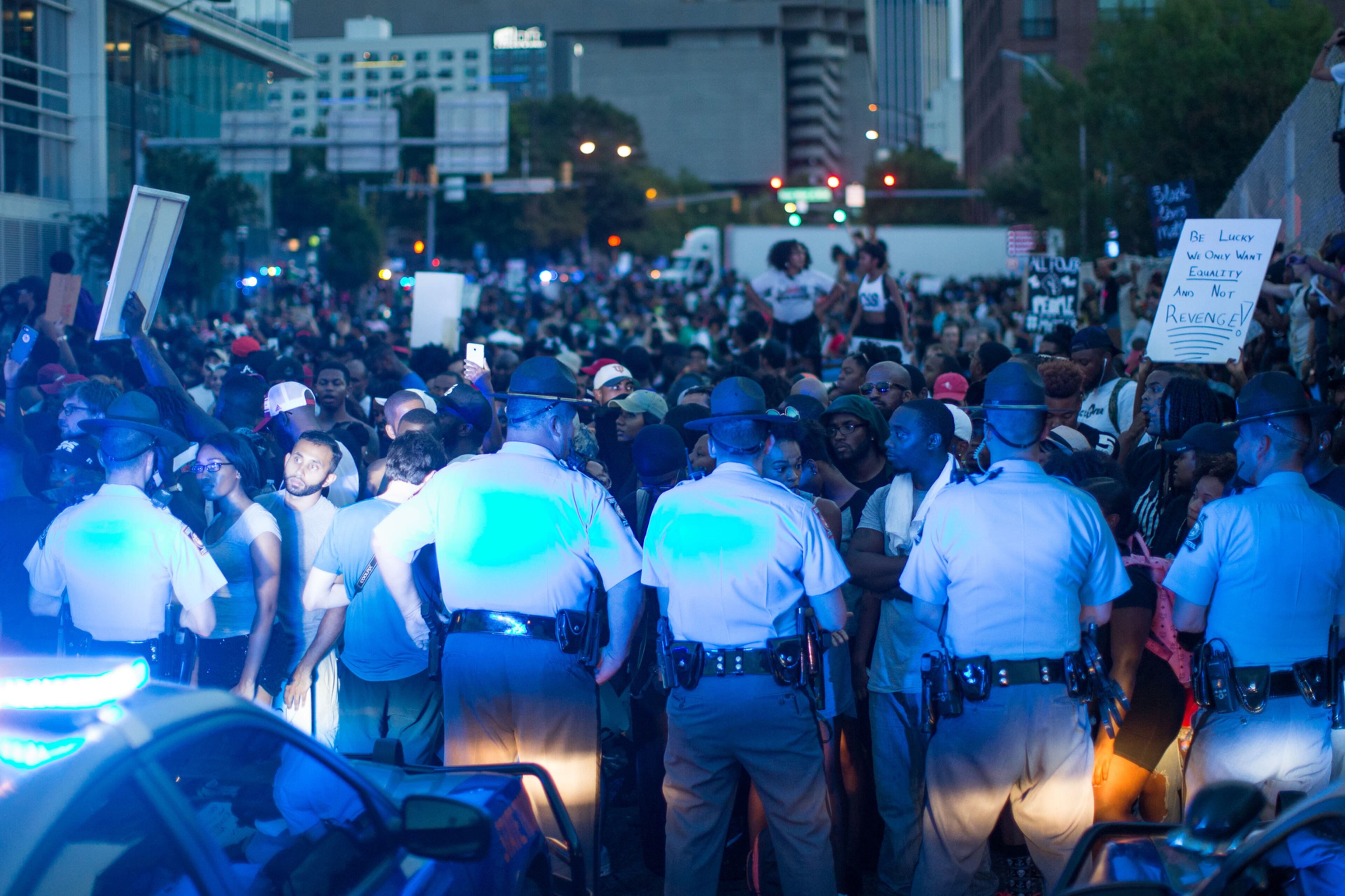 Officers standoff with demonstrators at the I-75/85 Williams Street exit, Friday, July 8, 2016. Demonstrators gathered following the deaths of Alton Sterling, 37, who was killed by Baton Rouge police outside of a convenience store where he was selling CDs, and Philando Castile, who was shot and killed when Minnesota police stopped him for a traffic violation on Wednesday evening. BRANDEN CAMP/SPECIAL
