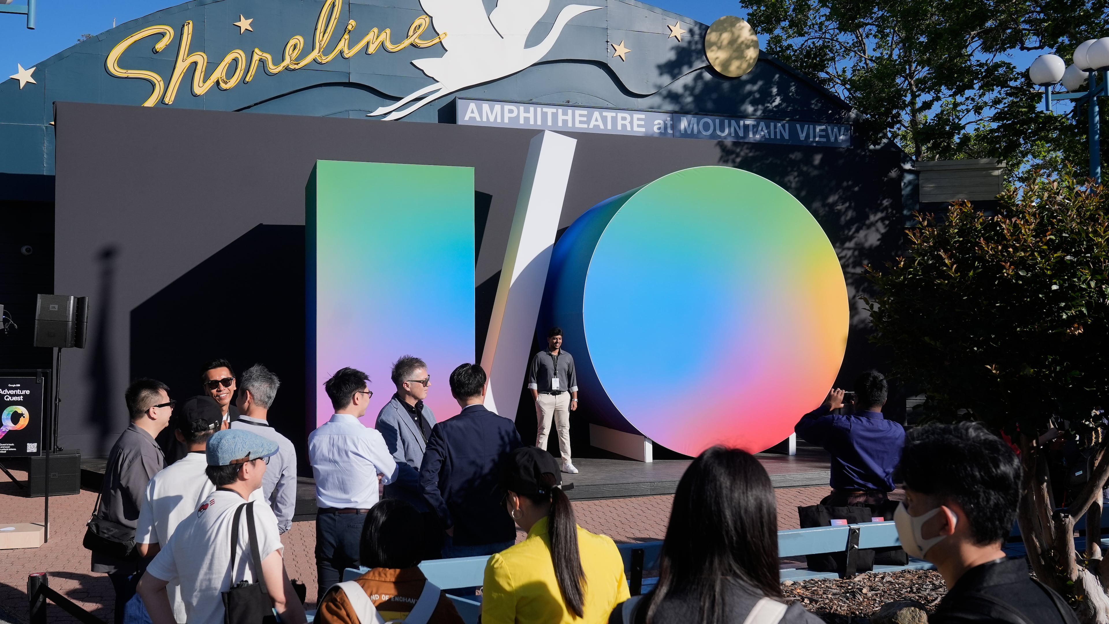 Attendees pose for photos before the keynote presentation at a Google I/O event in Mountain View, Calif., Tuesday, May 19, 2026. (AP Photo/Jeff Chiu)