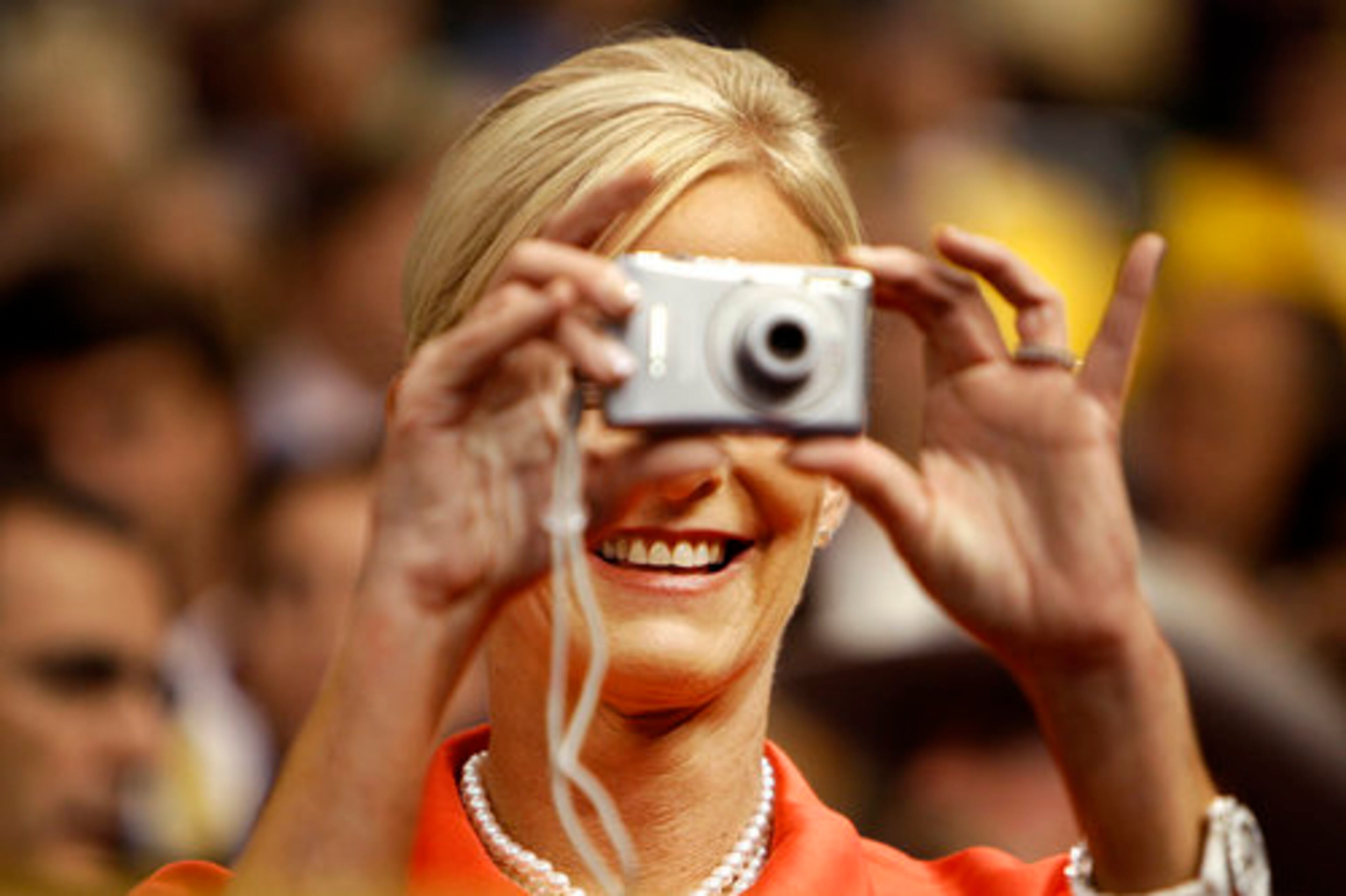 Cindy McCain, wife of Senator John McCain takes a photo on day two of the Republican National Convention at the Xcel Energy Center in St. Paul, Minn., on Tuesday.