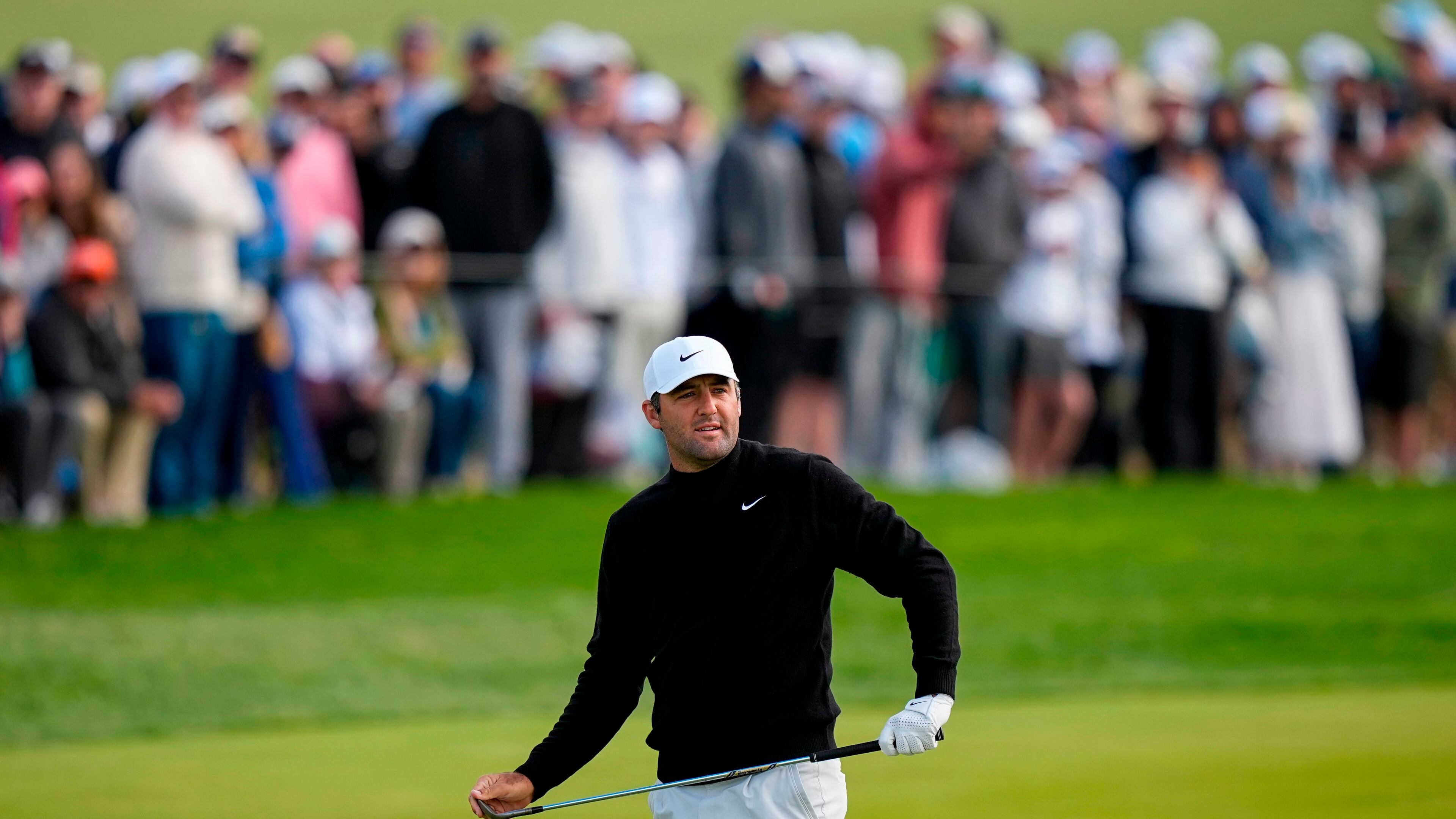 Scottie Scheffler watches his shot on the 10th green during the second round of the PGA Championship golf tournament at Aronimink Golf Club, Friday, May 15, 2026, in Newtown Square, PA. (AP Photo/Matt Slocum)