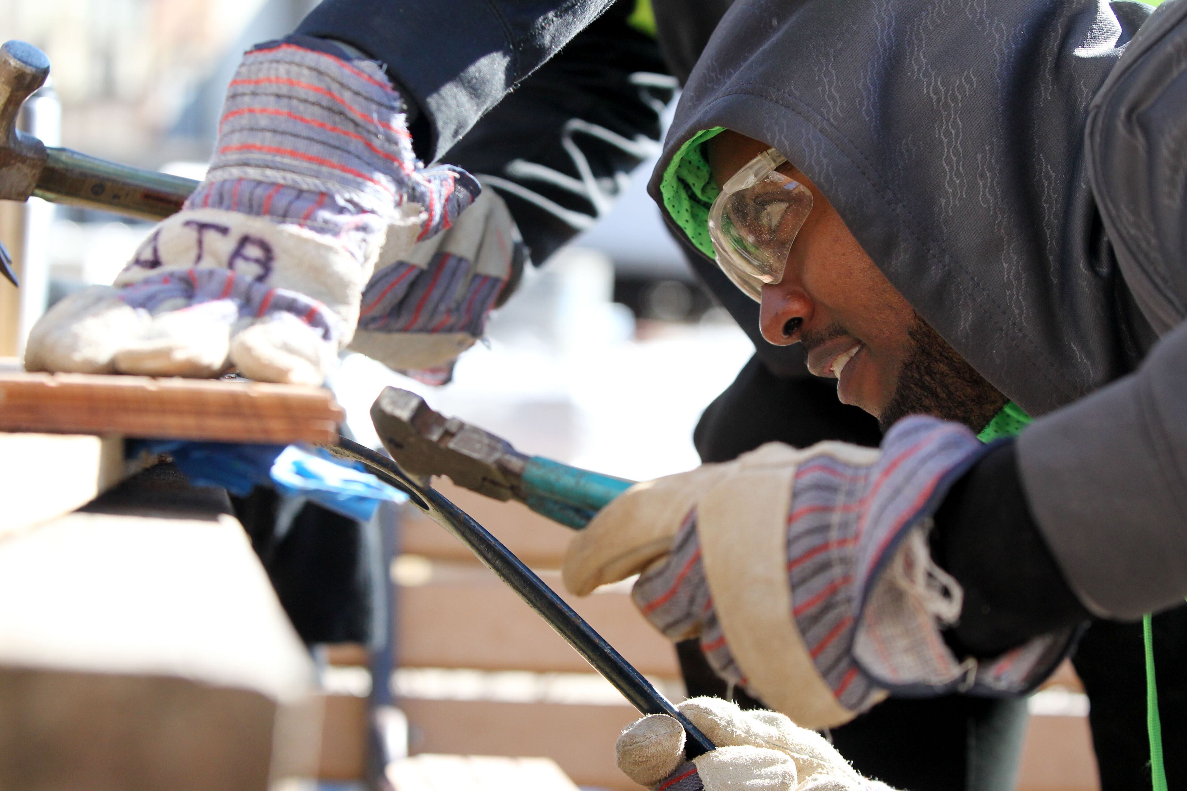 Kasahun Neselu volunteers at Lifecycle Building Center as part of Georgia Tech's MLK Day of Service. The Day of Service had 11 different projects where students could volunteer. TAYLOR CARPENTER / TAYLOR.CARPENTER@AJC.COM