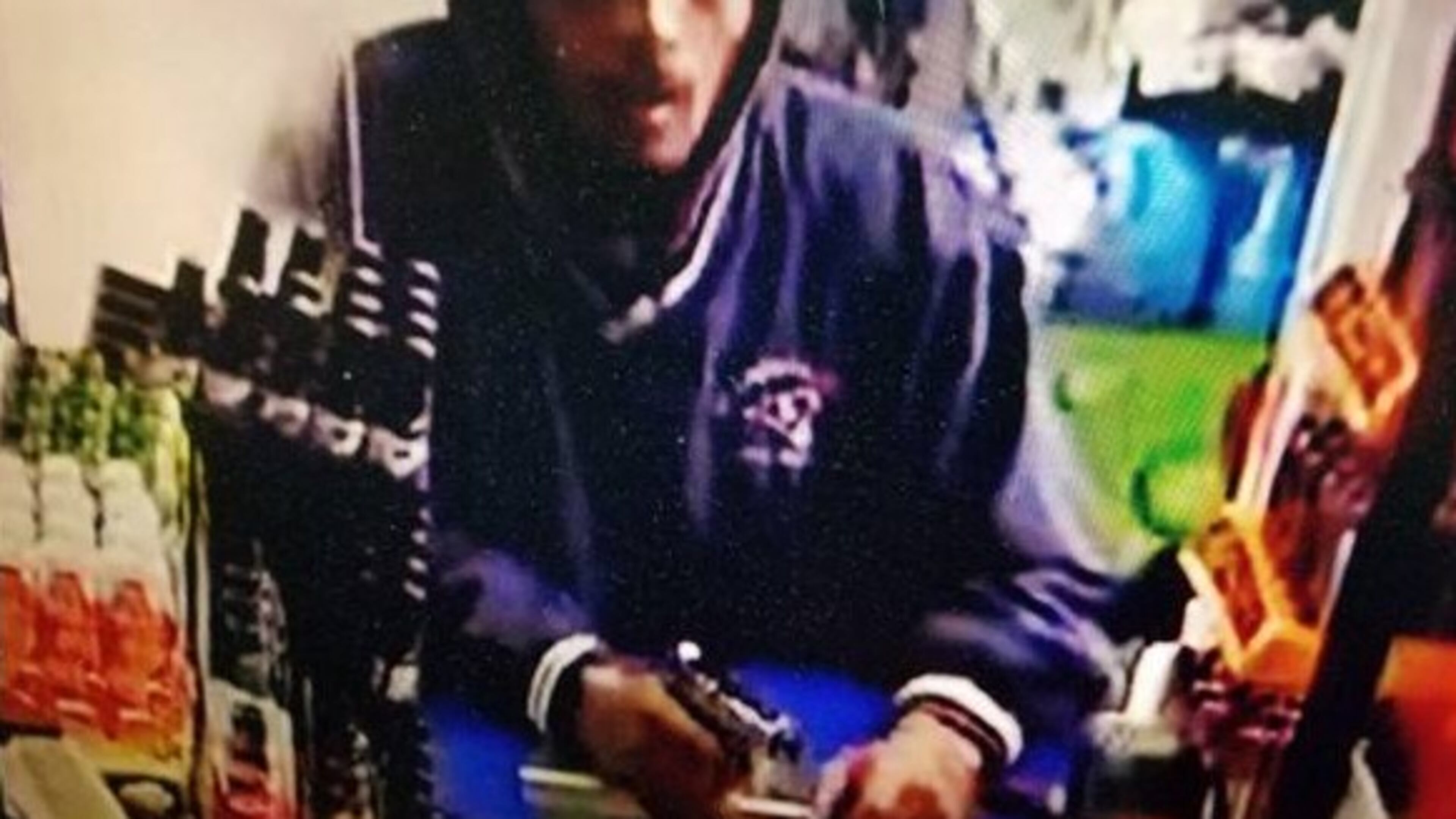 Police released a surveillance image of the armed robbery.