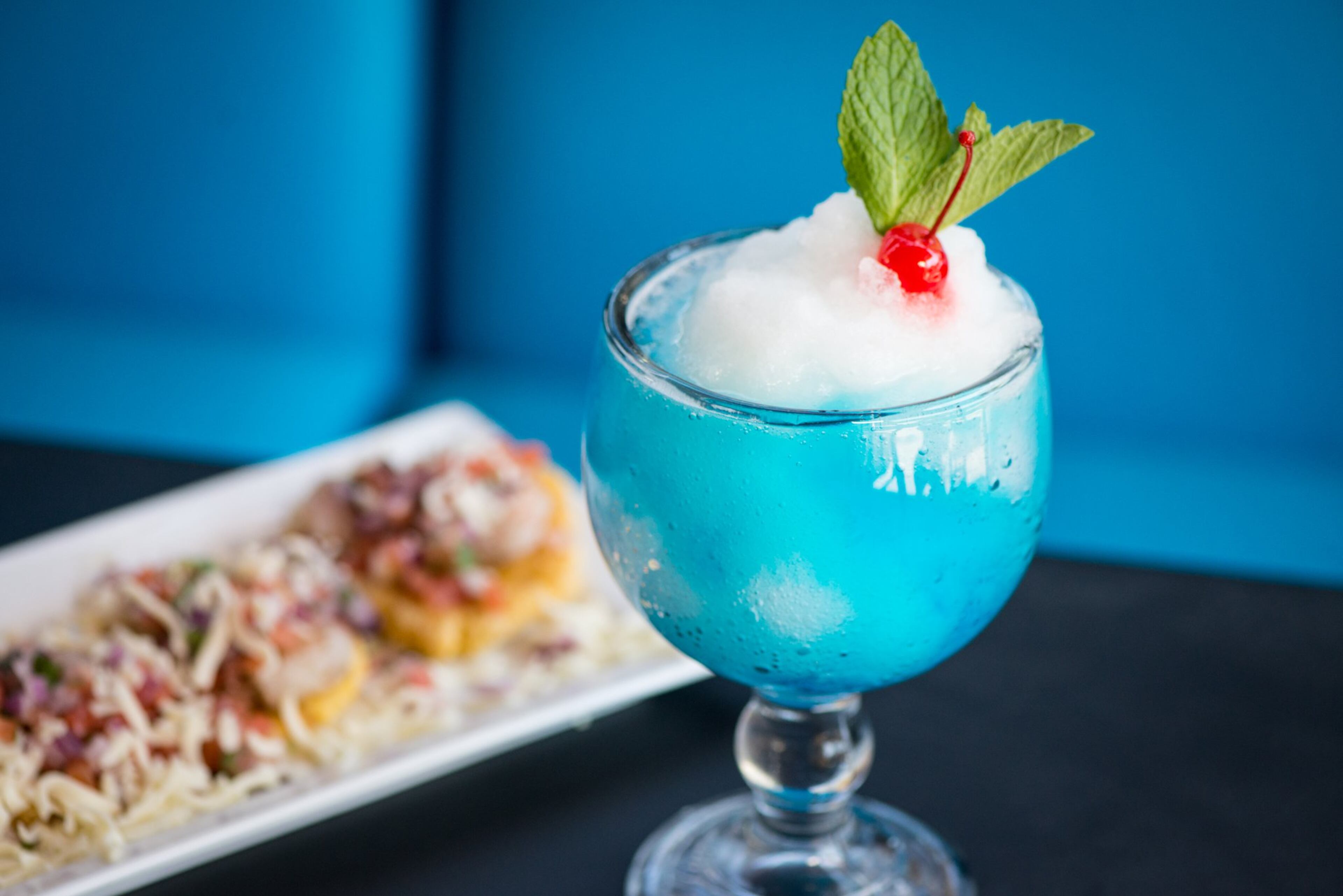 Papi's Iceberg cocktail is a daiquiri frappe with Blue Curacao. CONTRIBUTED BY MIA YAKEL