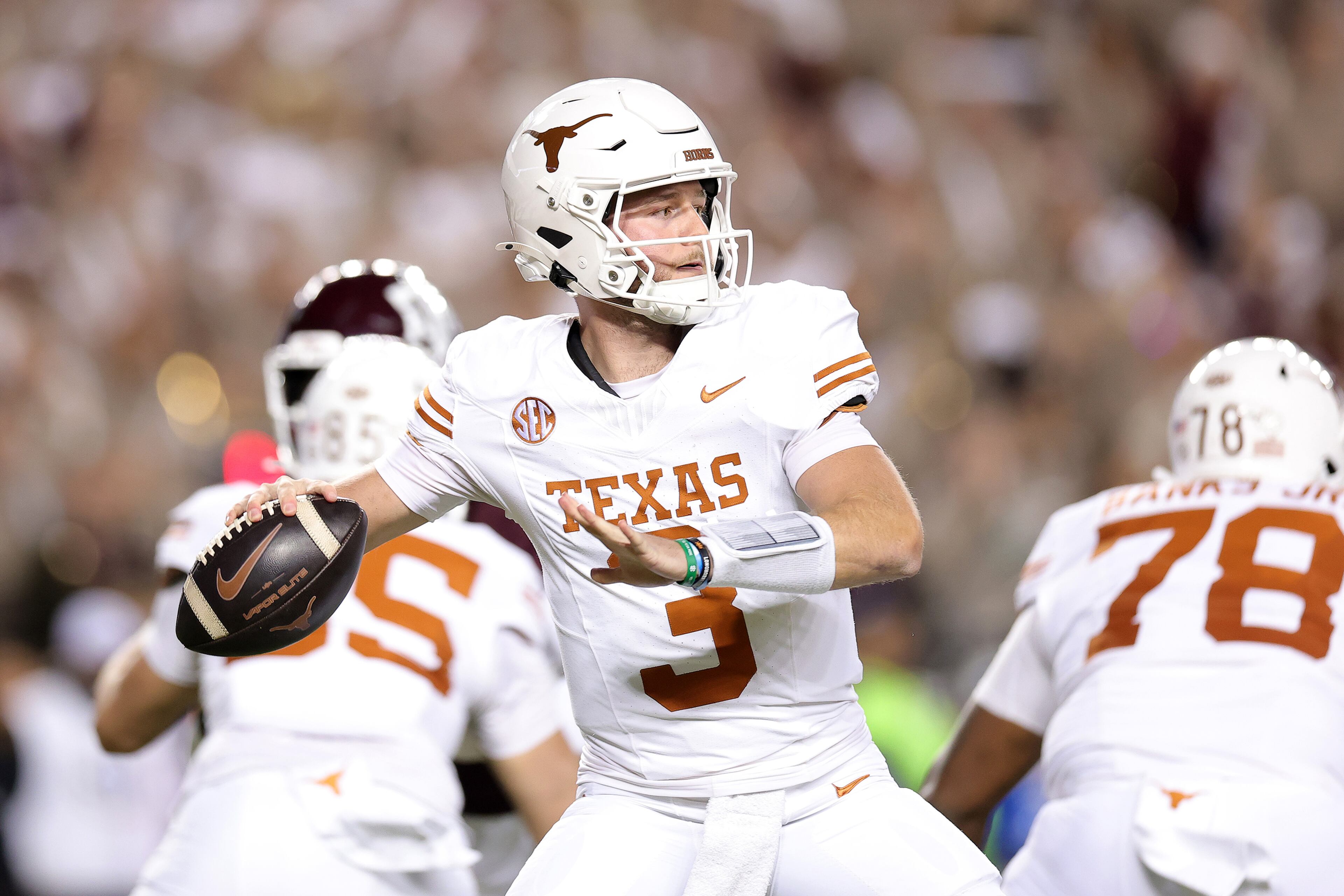 Texas quarterback Quinn Ewers (3) throws the ball during the first quarter against Texas A&M at Kyle Field on Saturday, Nov. 30, 2024, in College Station, Texas. (Alex Slitz/Getty Images/TNS)