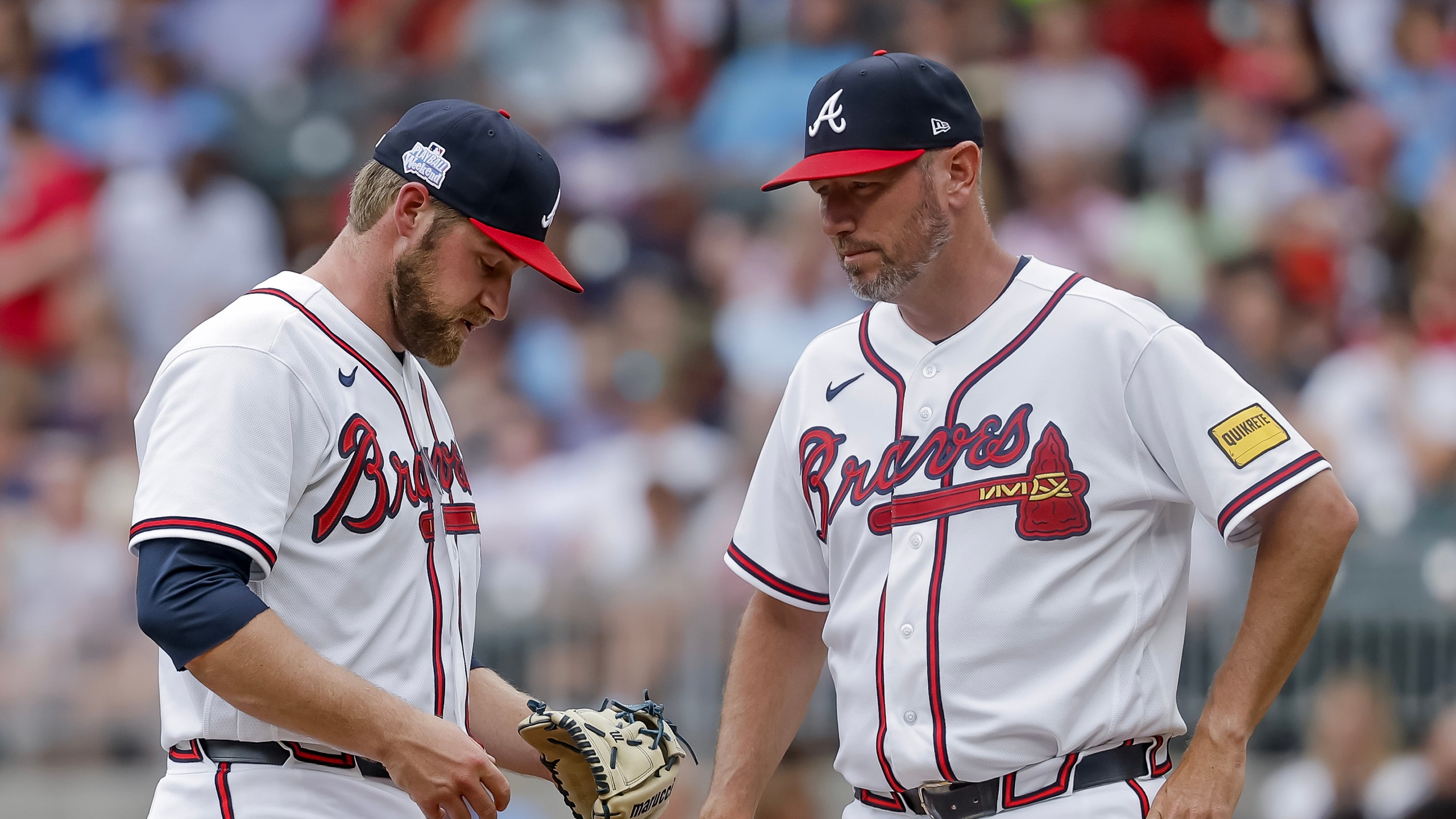 Braves pitcher Bryce Elder (left) — pictured during a mound visit by pitching coach Jeremy Hefner on June 7 against the Pirates — allowed eight runs and 12 hits with two walks in six innings Sunday against the Brewers. (Erik S. Lesser/AP)
