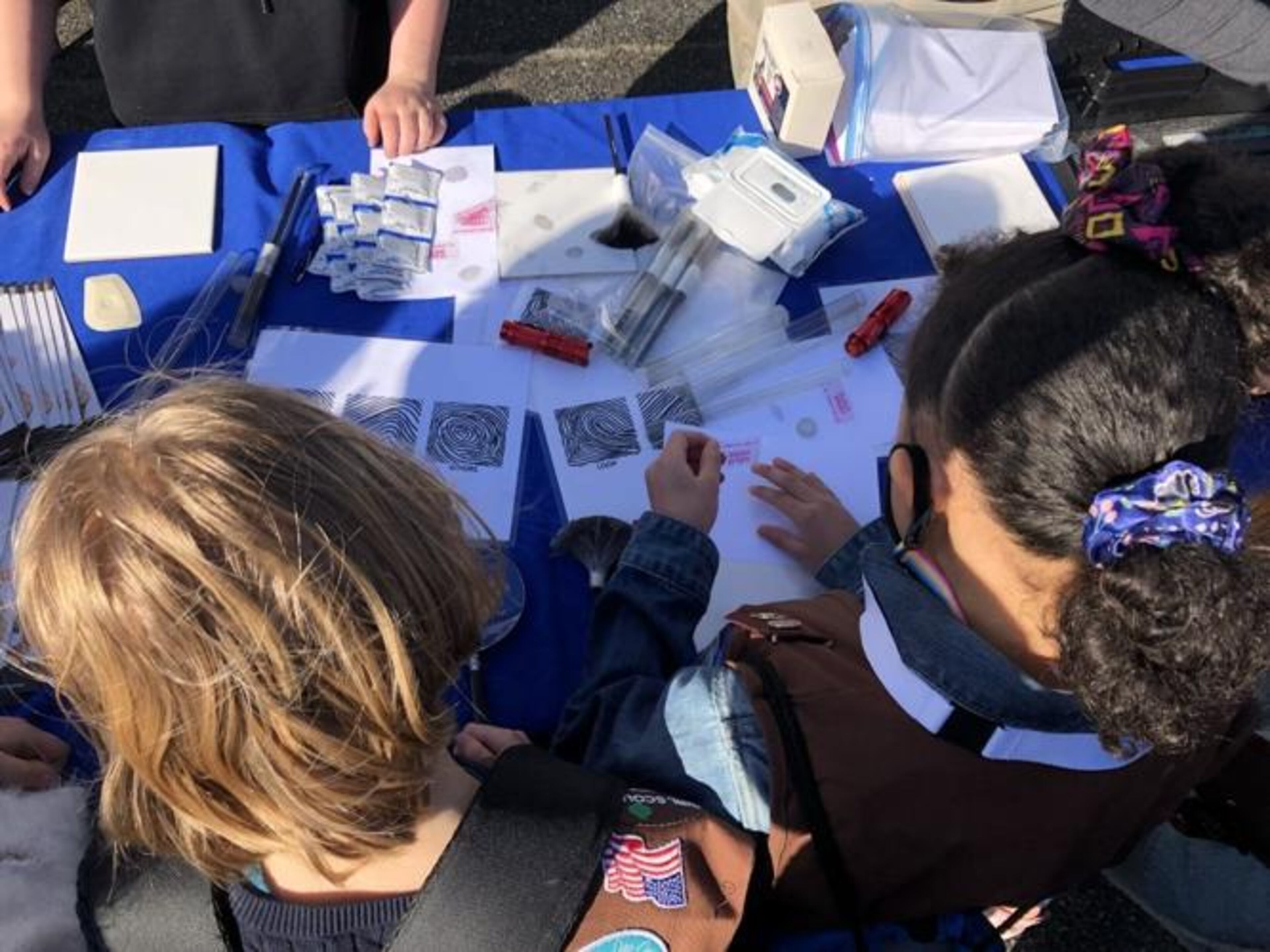 Activities vary at STEM Expo and can include building a robot, learning to protect waterways or fingerprint identification.