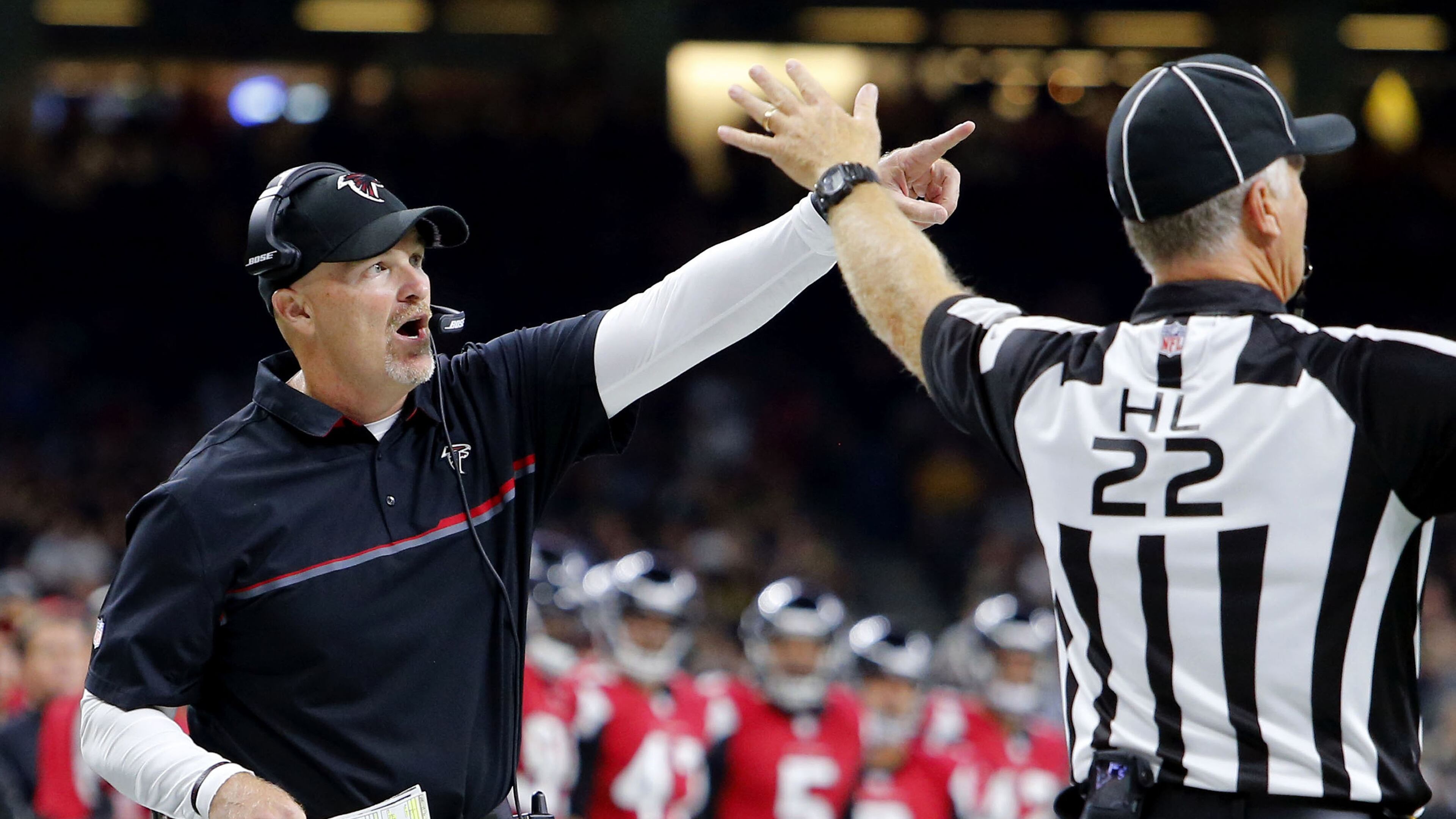 Atlanta Falcons head coach Dan Quinn challenges an official in the first half of an NFL football game against the New Orleans Saints in New Orleans, Monday, Sept. 26, 2016. (AP Photo/Butch Dill)