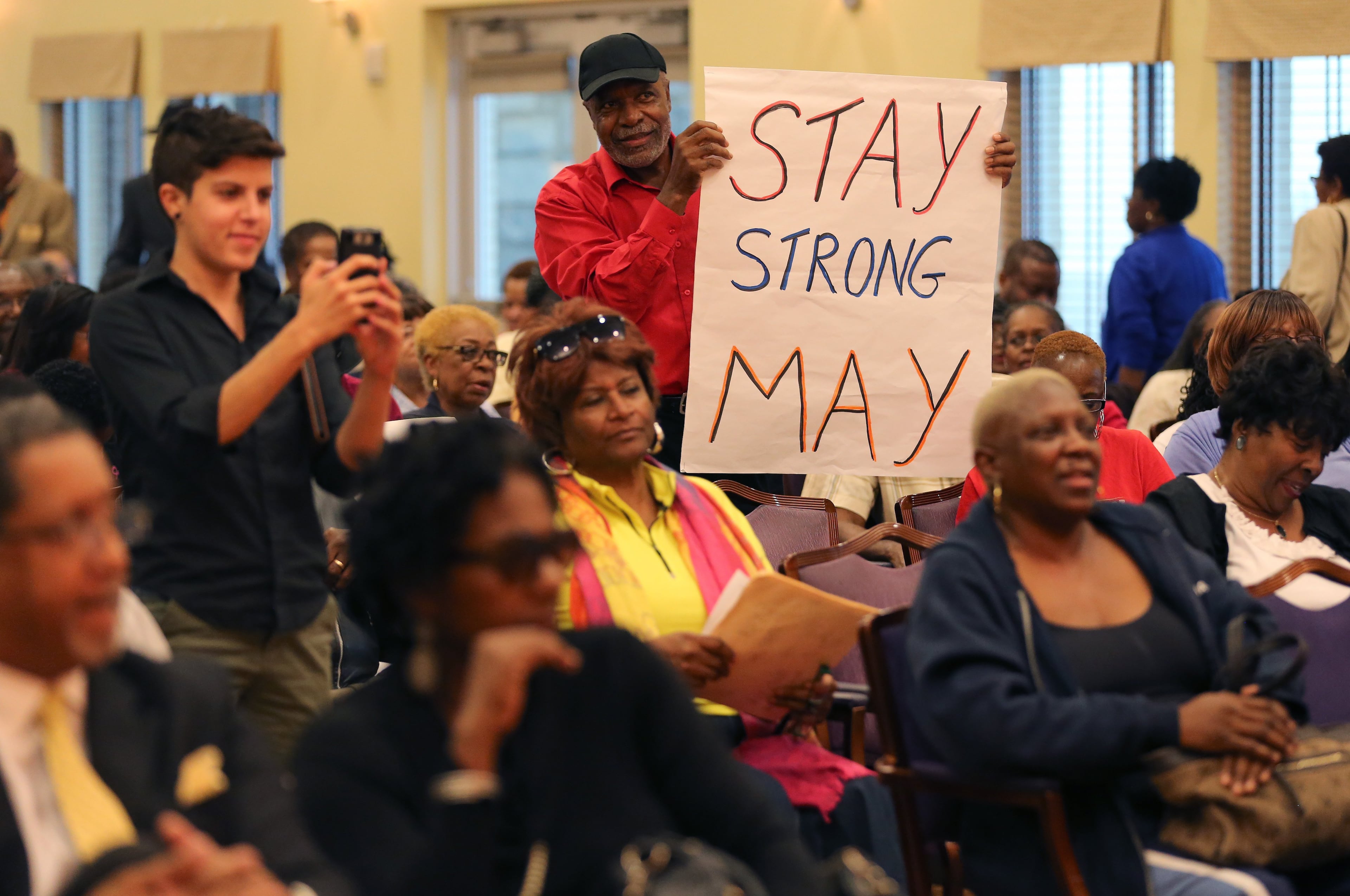 October 13, 2015 Lithonia: DeKalb resident Harvy Archer shows his support for interim DeKalb County CEO Lee May during a Tuesday evening October 13, 2015 forum at the Lou Walker Senior Center in Lithonia. Ben Gray / bgray@ajc.com