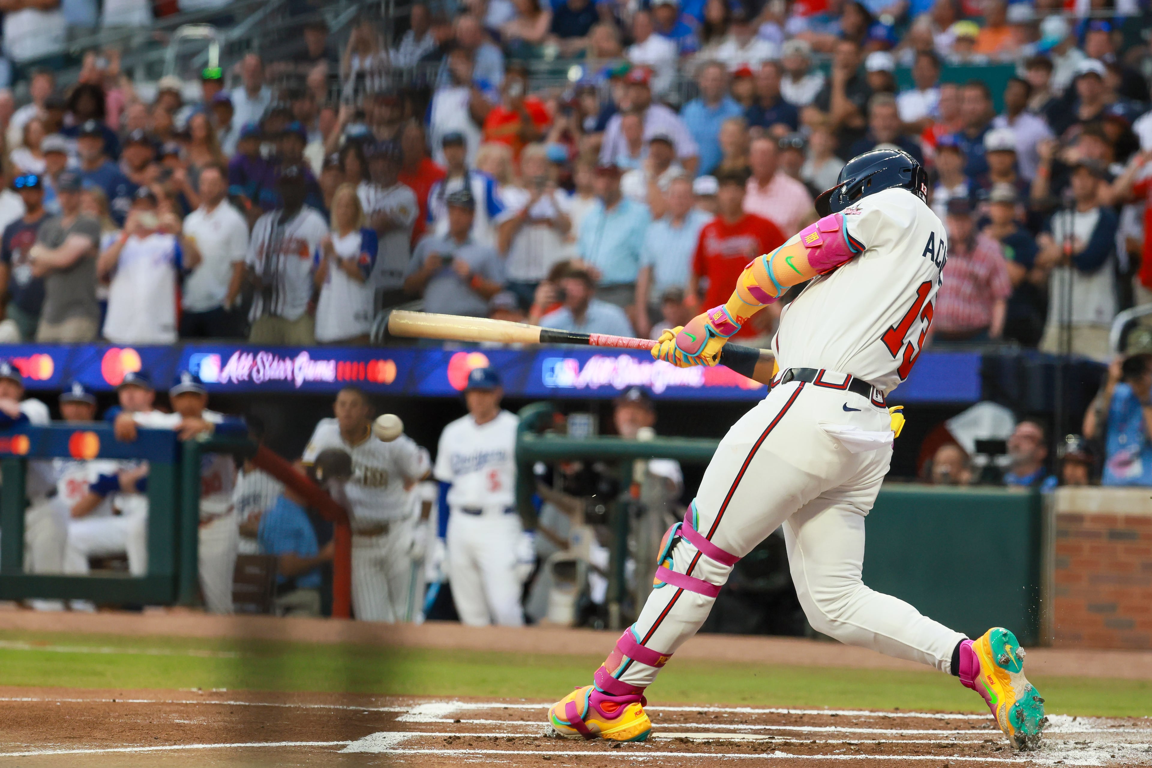 National League batter Ronald Acuña Jr. of the Atlanta Braves singles against the American League during the first inning of the MLB All-Star Game at Truist Park in Atlanta on Tuesday, July 15, 2025. (Jason Getz/AJC)