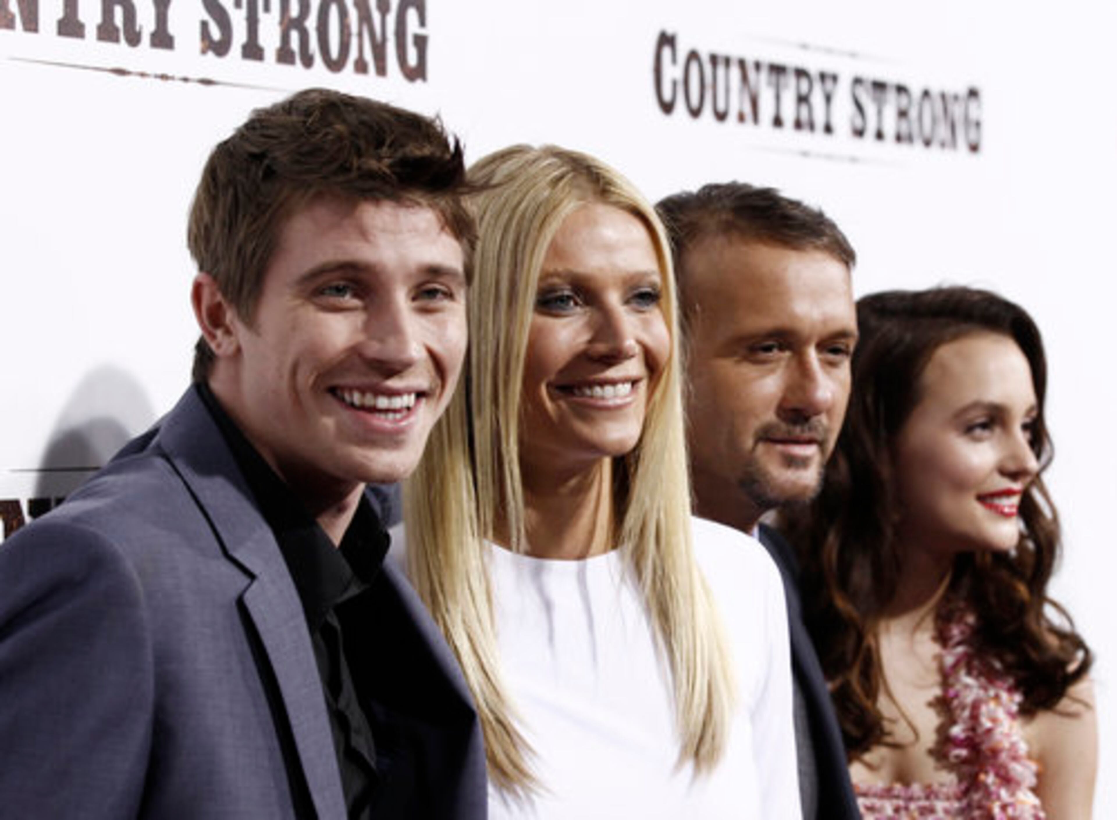 From left, cast members Garrett Hedlund, Gwyneth Paltrow, Tim McGraw, and Leighton Meester pose at a screening of 'Country Strong' in Beverly Hills on Tuesday, Dec. 14, 2010. The film, set to be released Jan. 7, stars Paltrow as Kelly Canter and Hedlund as Beau Williams, a rising young singer -songwriter who gets involved with fallen country music star Kelly Canter (Paltrow) and the pair embark on a tour to resurrect her career.