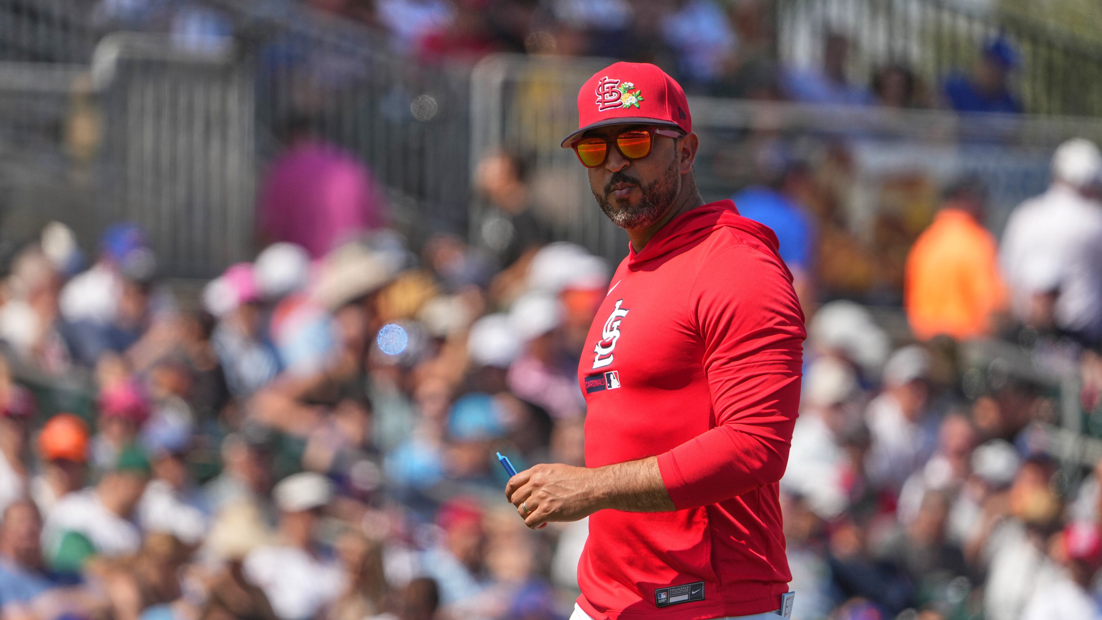 St. Louis Cardinals manager Oliver Marmol walks back from the mound after making a pitching change during the second inning of a spring training baseball game against the New York Mets Friday, Feb. 27, 2026, in Jupiter, Fla. (AP Photo/Jeff Roberson)