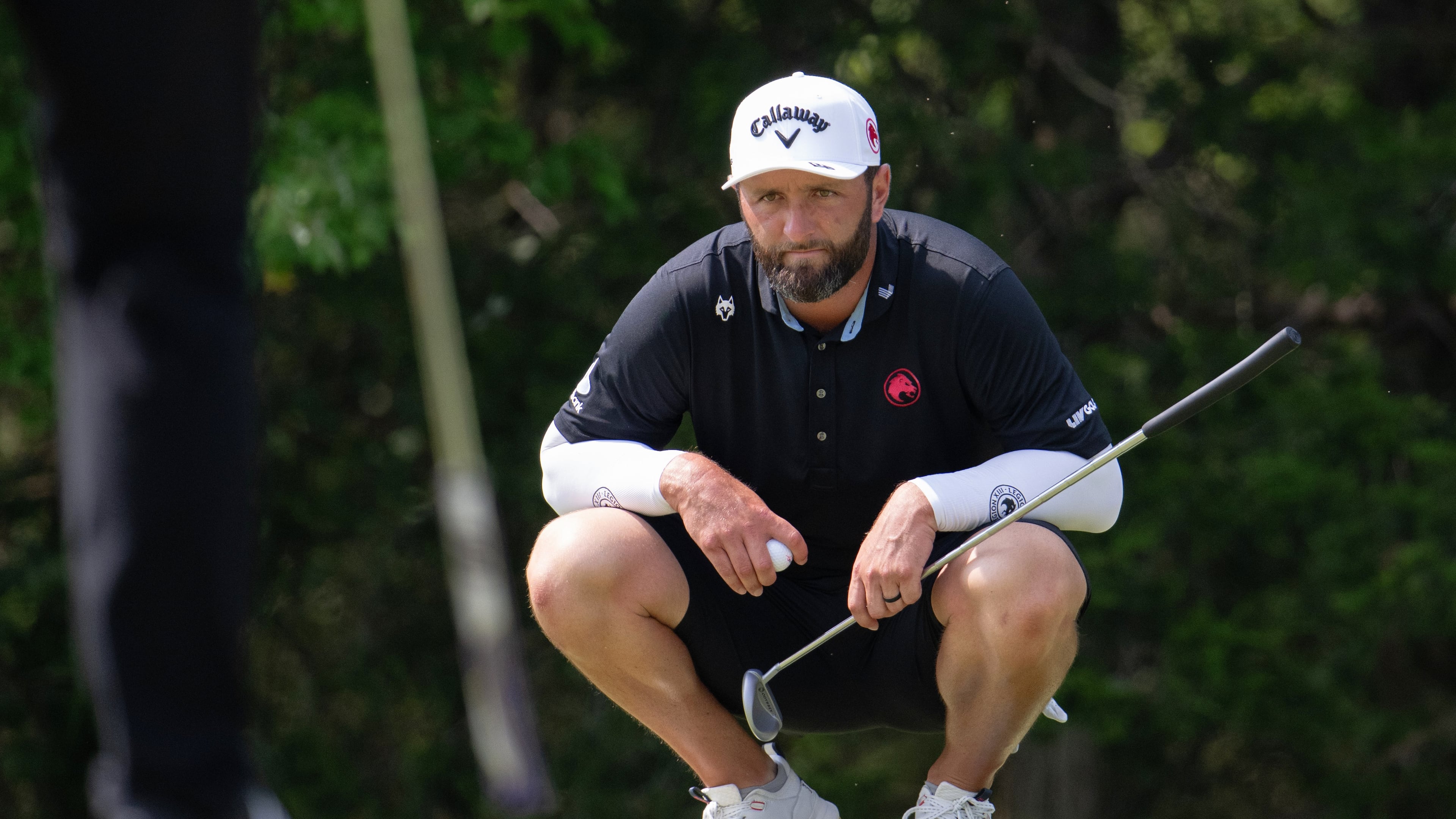 FILE - Captain Jon Rahm of Legion XIII reads his putt during the final round of LIV Golf Bedminster at Trump National Golf Club on Sunday, Aug. 9, 2026 in Bedminster, N.J. (Montana Pritchard/LIV Golf, File)