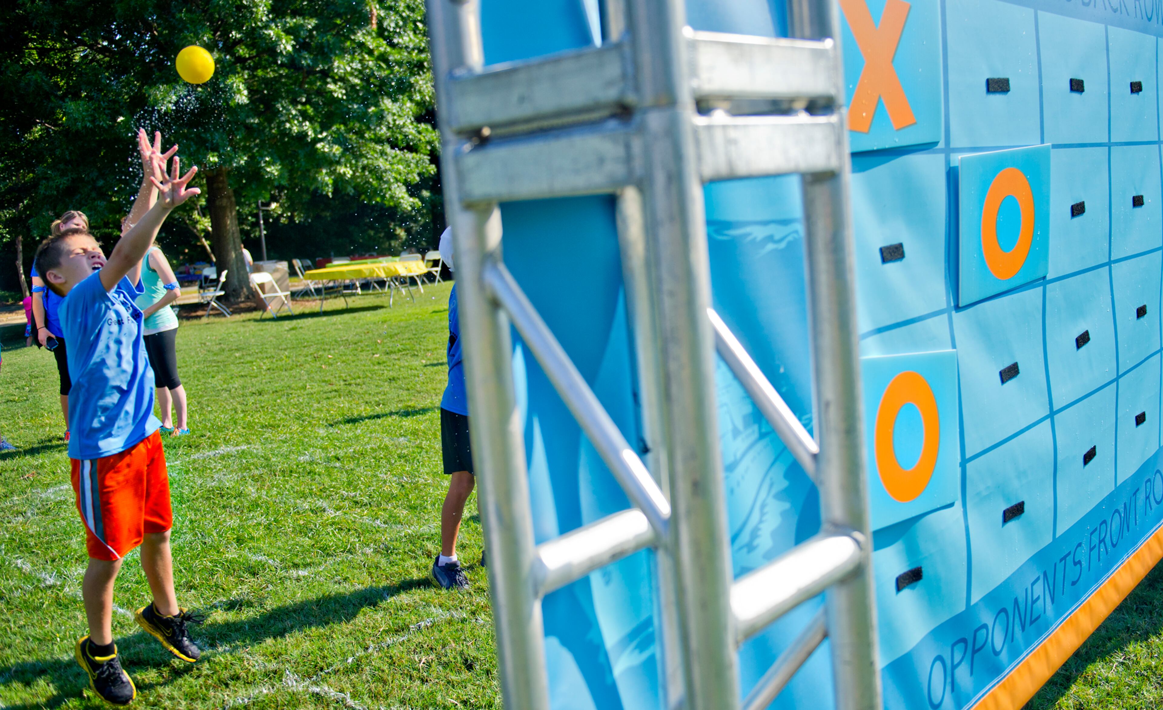 Zach Spangler plays a game of living battleship during the Boys & Girls Clubs of America's Day for Kids at Piedmont Park in Atlanta on Saturday, September 7, 2013. Day for Kids is a national initiative to raise awareness for critical issues facing young men and women. With more than a decade of tradition, Day for Kids invites adults to act like kids again by participating in field day events such as relay races, dodge ball, tug of war and lots of other activities. JONATHAN PHILLIPS / SPECIAL