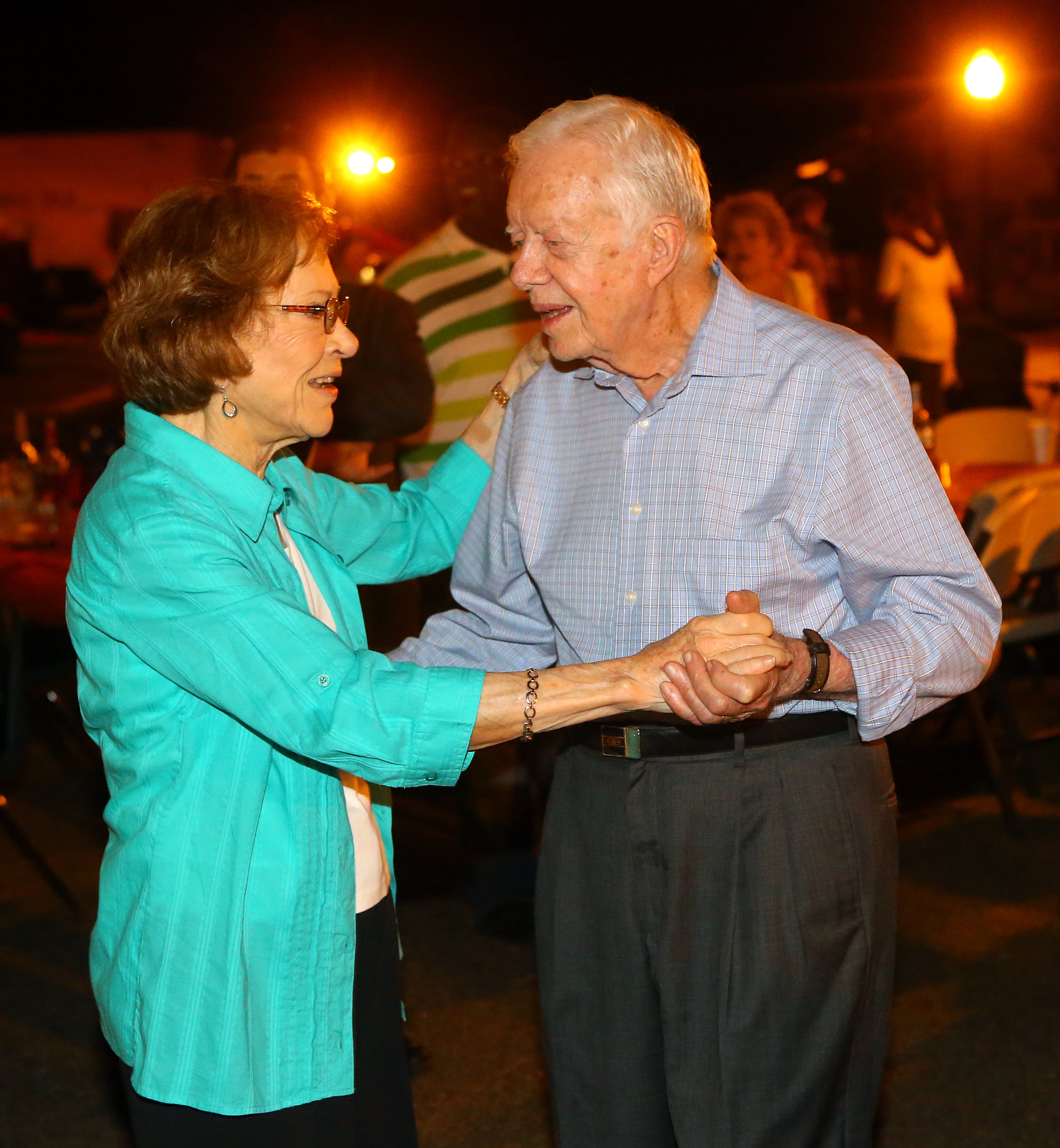 2014: Jimmy and Rosalynn Carter join in the Festival Dance on Main Street during the 18th Annual Plains Peanut Festival in Plains. (Curtis Compton / ccompton@ajc.com)