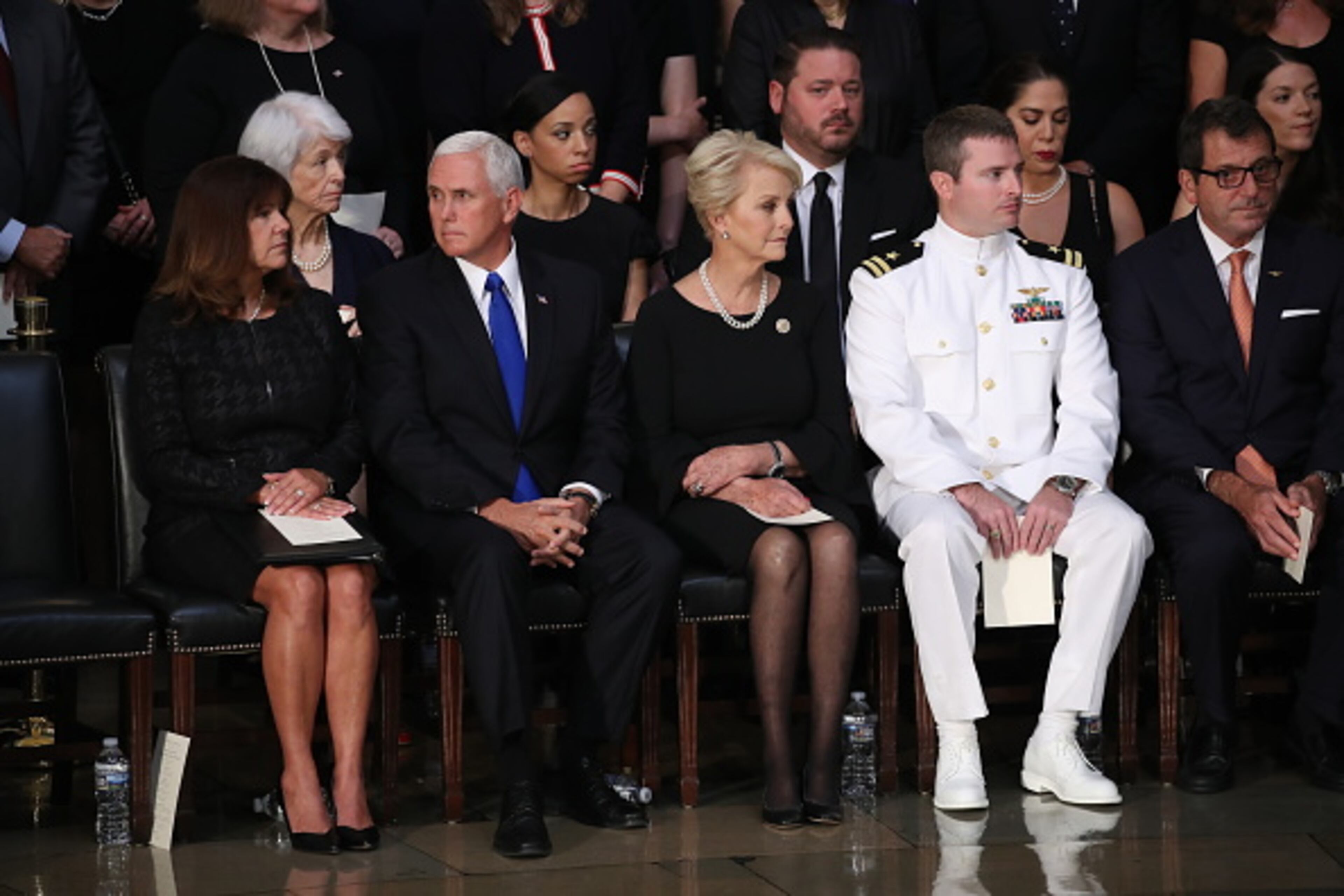 WASHINGTON, DC - AUGUST 31: Cindy McCain (C), wife of John McCain, sits with her son John (Center-R), US Vice President Mike Pence (2nd-L) and his wife Karen Pence (L) inside the Rotunda of the U.S. Capitol, August 31, 2018 in Washington, DC. A Democrat who voted for Hillary Clinton, Farone said McCain did what was right. "He never took the easy way out, he knew actions speak louder than words and he never tweeted about it. He just got it done," she said. The late senator died August 25 at the age of 81 after a long battle with brain cancer. He will lie in state at the U.S. Capitol Friday, a rare honor bestowed on only 31 people in the past 166 years. Sen. McCain will be buried at his final resting place at the U.S. Naval Academy on Sunday. (Photo by Drew Angerer/Getty Images)