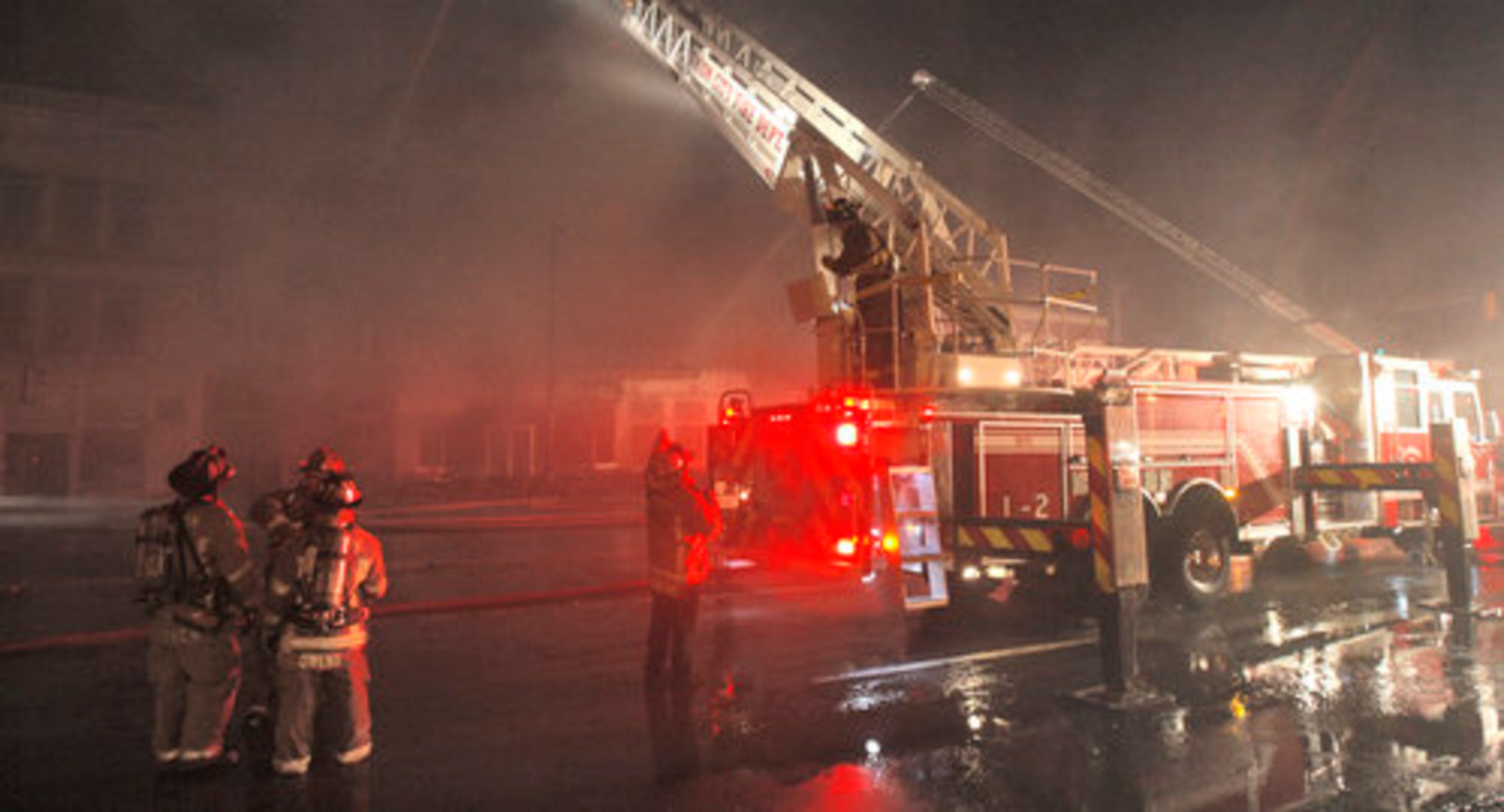 Fulton County firefighters keep an eye on their stream from Truck 7.