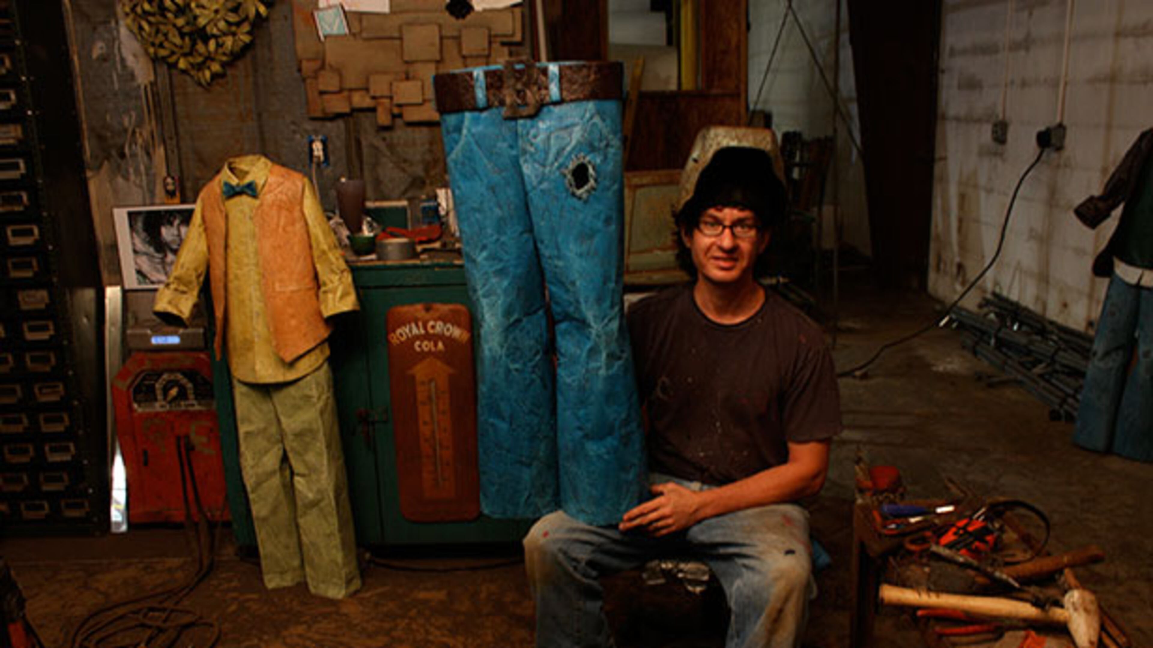 Dalton artist Chris Beck, shown with one of his sculptures in his studio, will be one of the many artists at Folk Fest, being held Aug. 15-17 at North Atlanta Trade Center in Norcross.