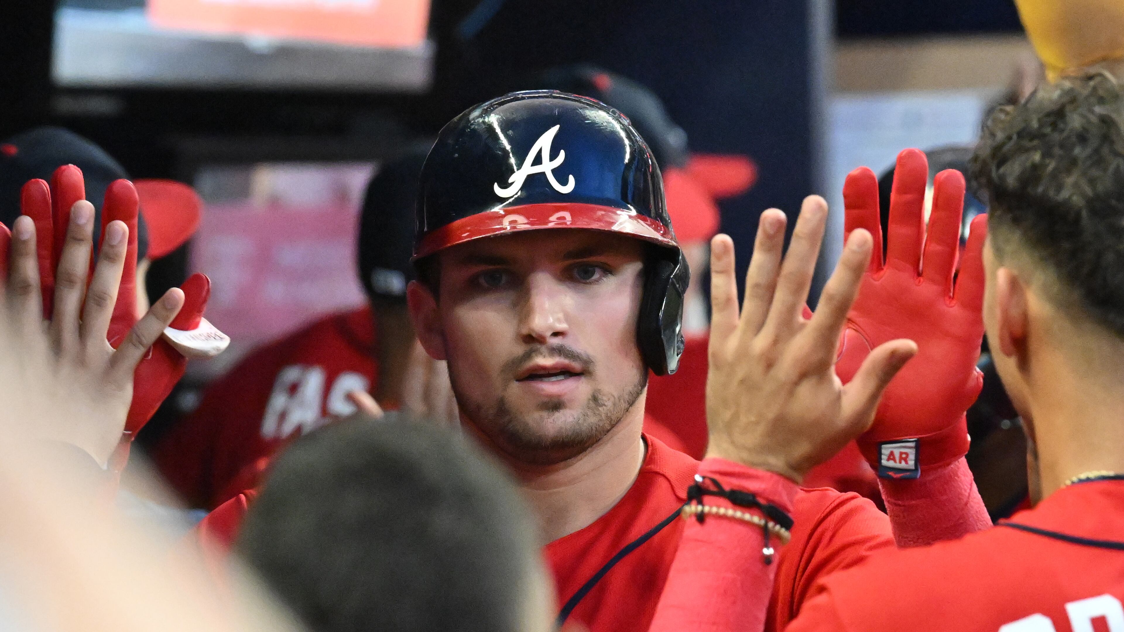 Braves third baseman Austin Riley celebrates after hitting three run home run in the third inning at Truist Park on Friday, August 19, 2022. (Hyosub Shin / Hyosub.Shin@ajc.com)