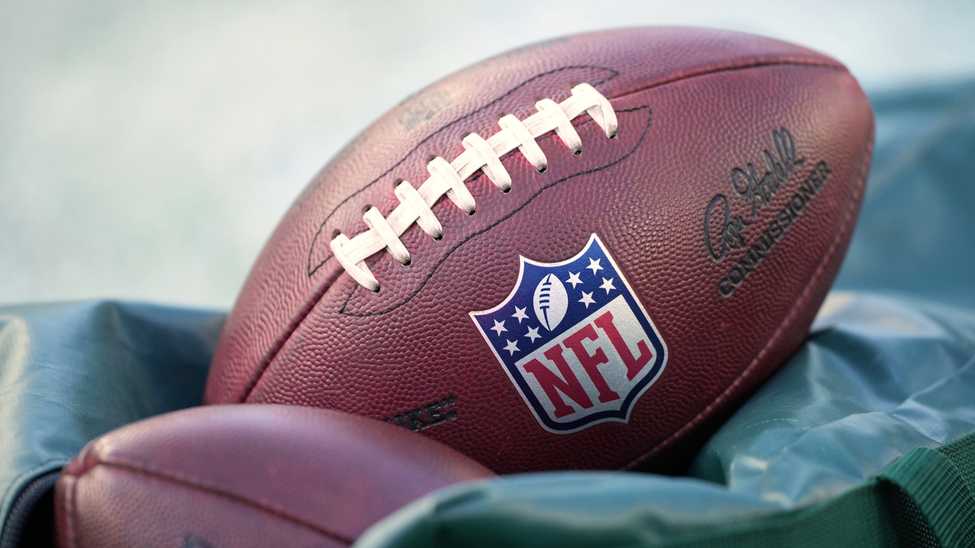 FILE - Footballs are seen before an NFL football game in Philadelphia on Jan. 4, 2026. (AP Photo/Matt Slocum, File)