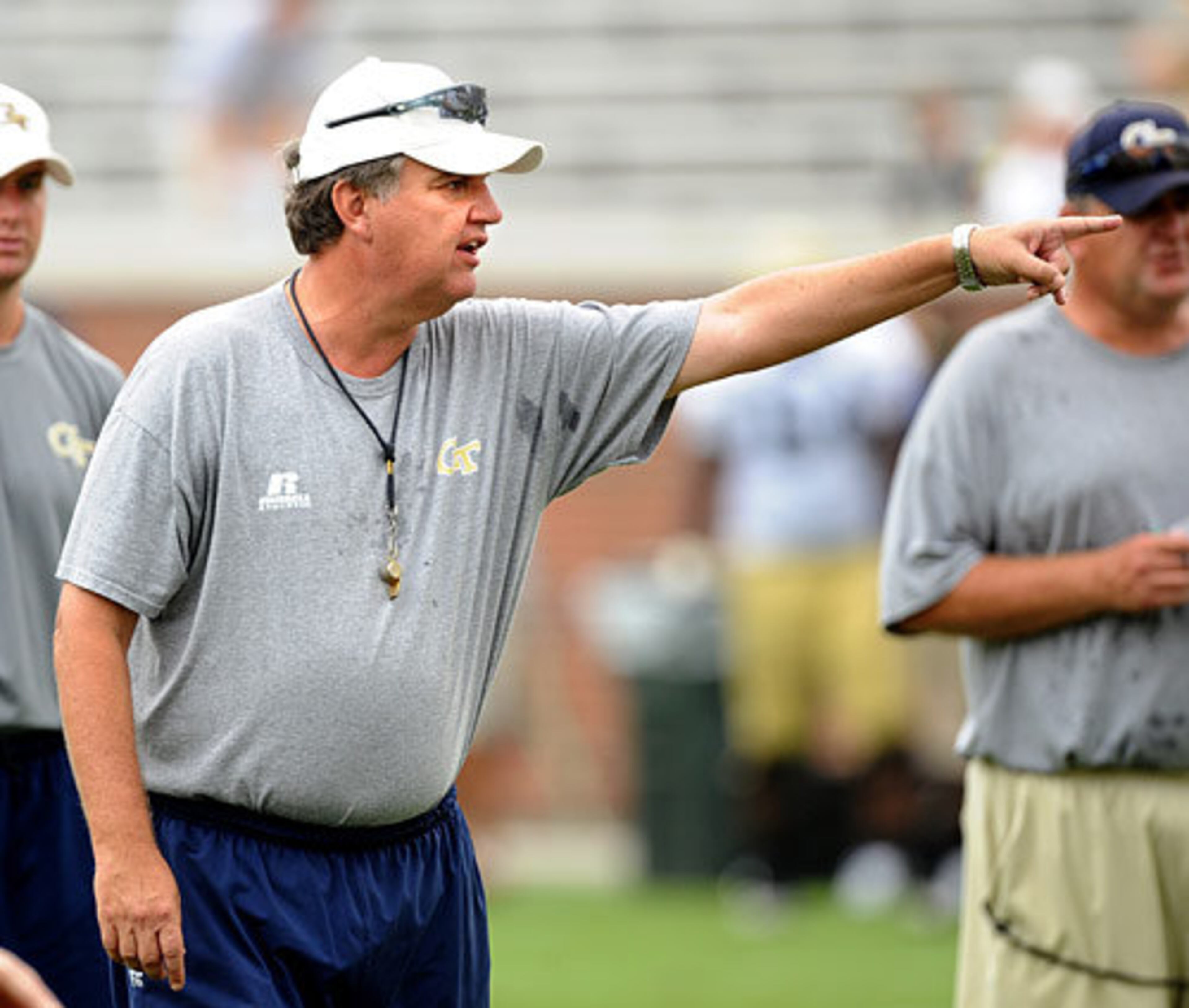 Georgia Tech head coach Paul Johnson points a player in the right direction during the Jackets' scrimmage.