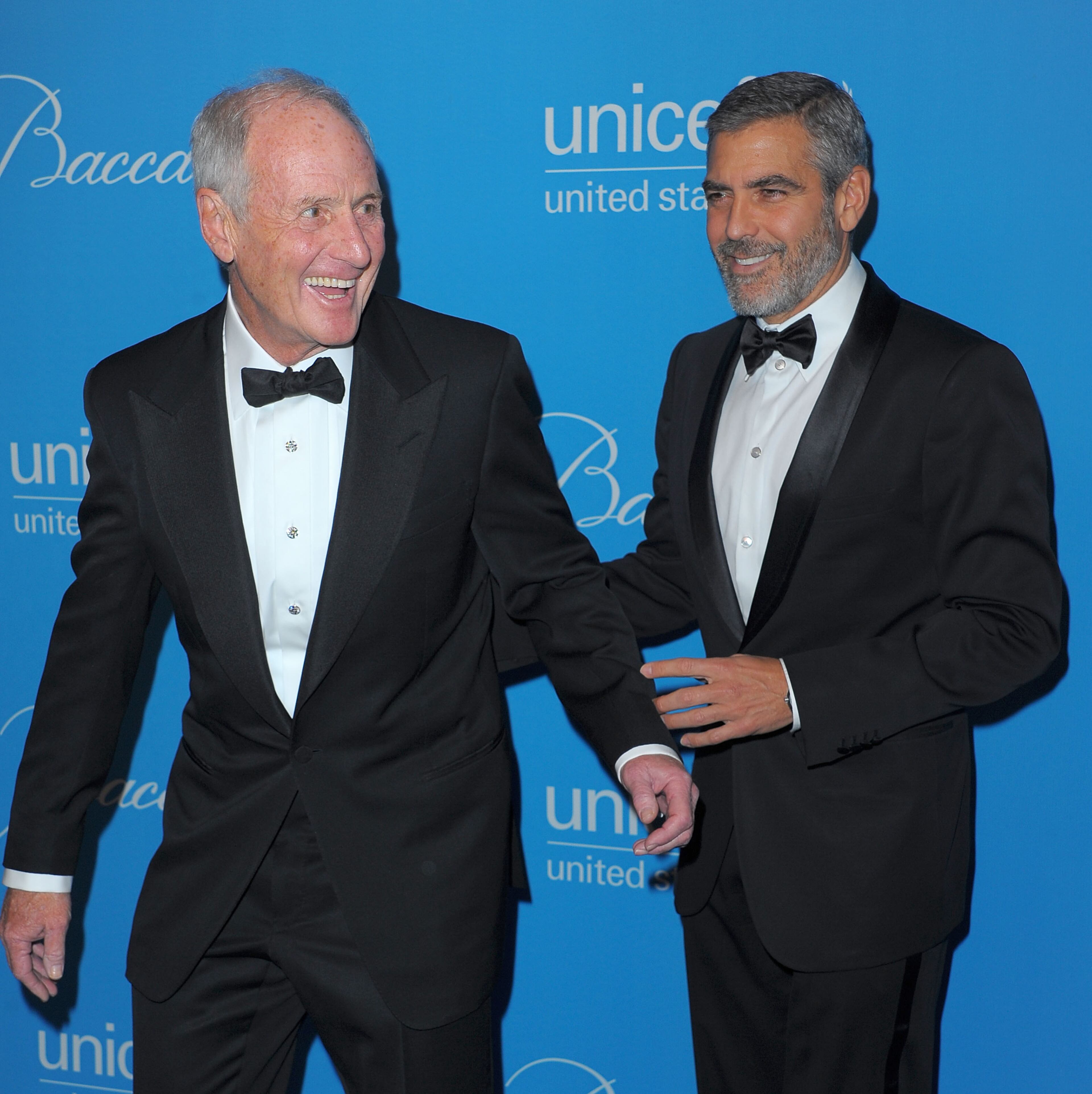 George Clooney and Brad Pitt challenged the producer to a drinking game on a flight. By the end of the flight, Weintraub was the only one of the three who was drunk and had lots of m&m's candies in his pants.