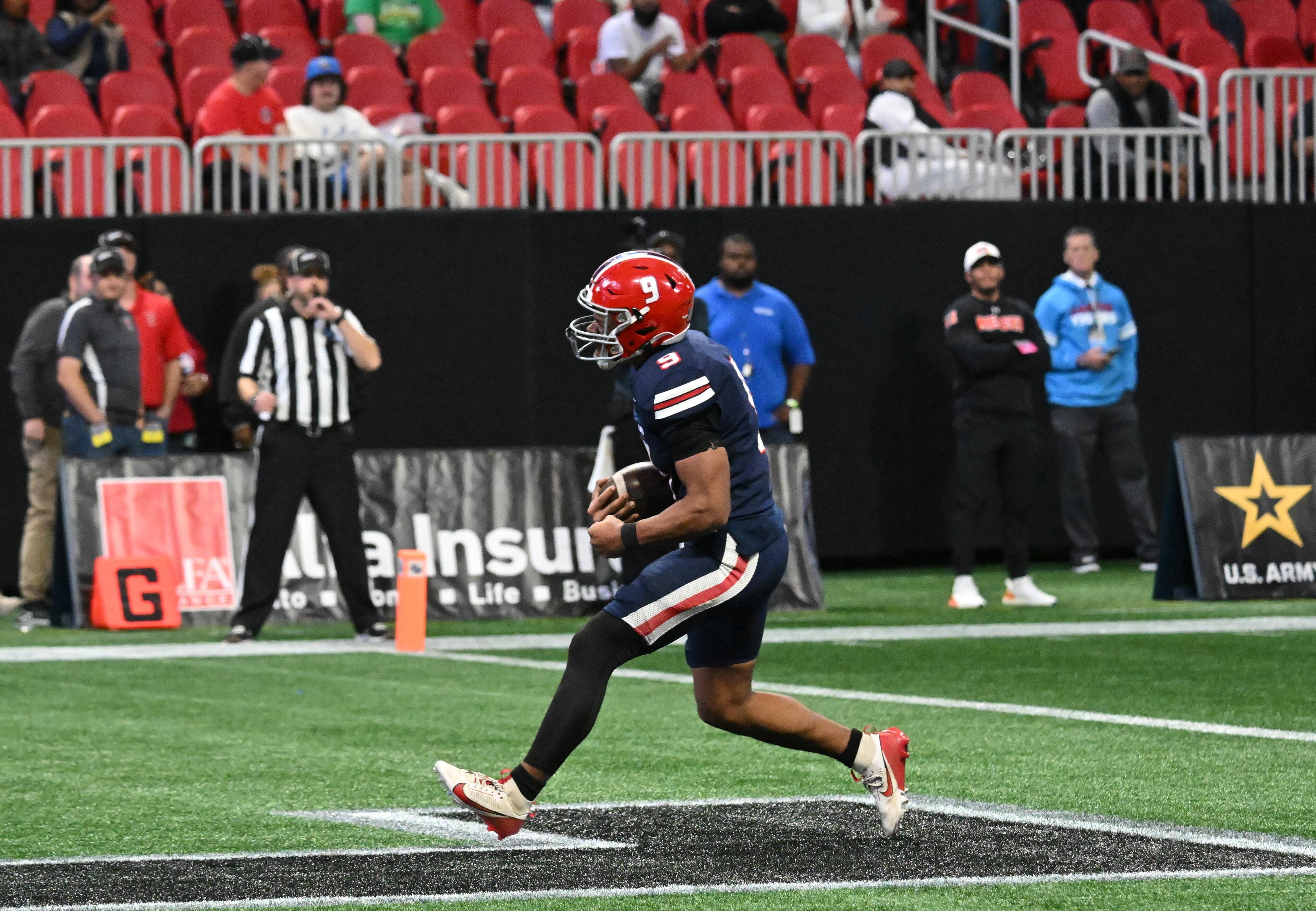 Toombs County's Justin Powell (9) scores a touchdown during the fourth quarter in GHSA Class A-Division State Championship game at Mercedes-Benz Stadium, Tuesday, December 17, 2024, in Atlanta. Toombs County won 38-18 over Northeast Macon. (Hyosub Shin / AJC)