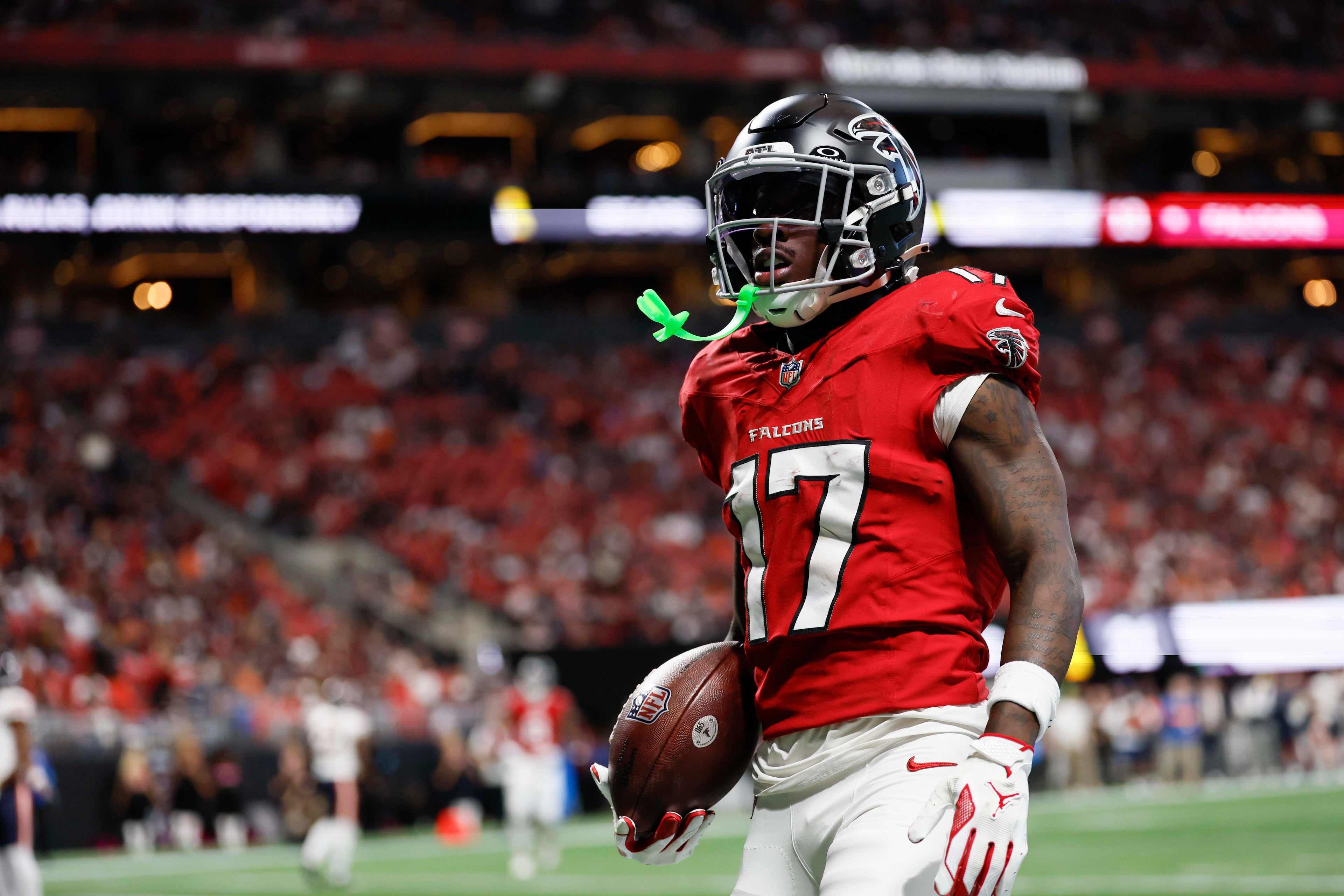 Atlanta Falcons wide receiver Zachariah Branch runs with the ball after catching a two-point conversion in the second half of an NFL game against the Chicago Bears at Mercedes-Benz Stadium in Atlanta on Sunday, Oct. 18, 2026. (Miguel Martinez/AJC)