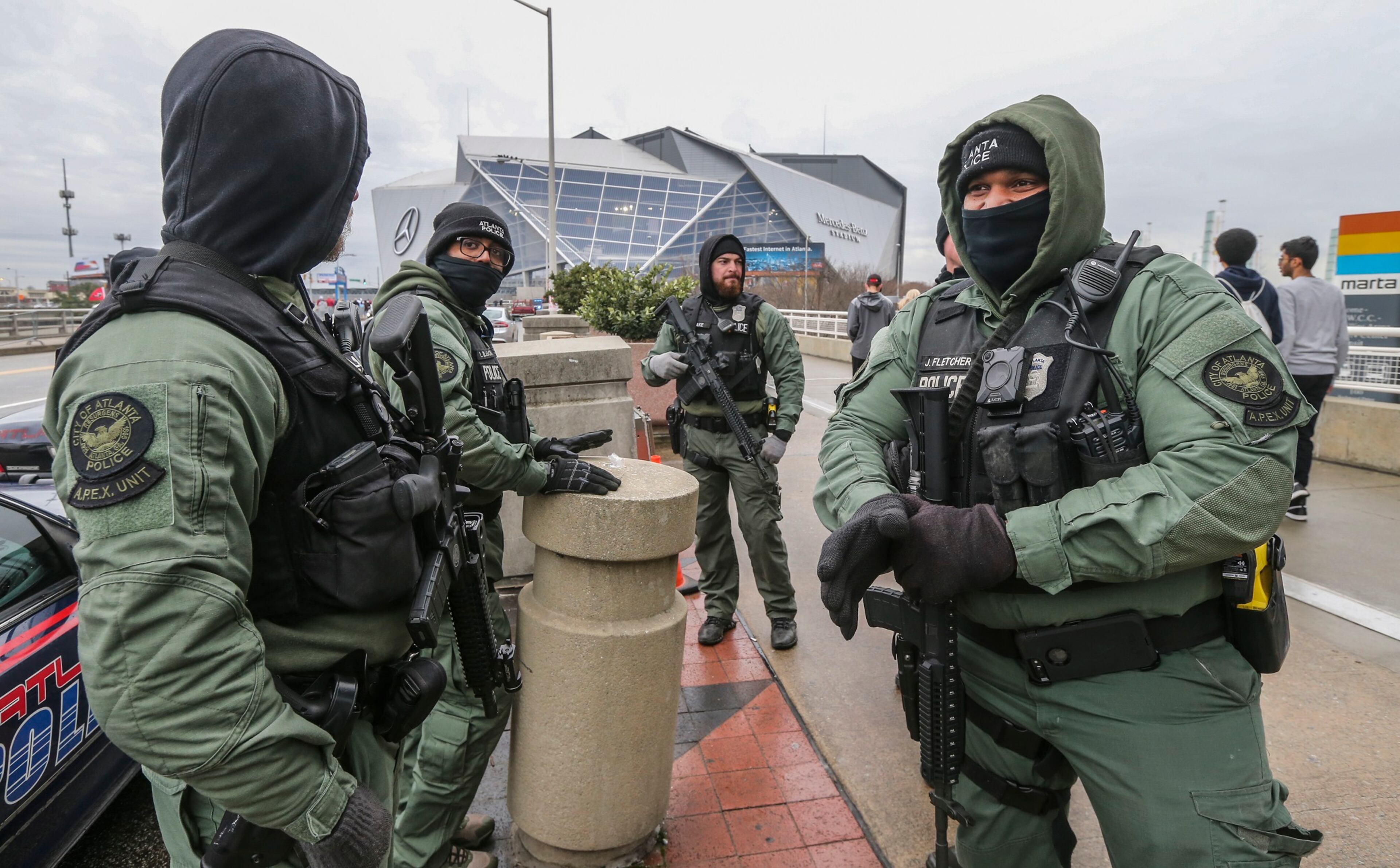 January 8, 2018 Atlanta: Atlanta police department security maintained high visibility in the stadium perimeter in downtown Atlanta on Monday, Jan. 8, 2018. The Alabama Crimson Tide were 3.5-point favorites going into Monday nightâs College Football Playoff Championship against the Georgia Bulldogs at Atlantaâs Mercedes-Benz Stadium. Gov. Nathan Deal ordered non-essential state offices from Columbus to Augusta and northward to close Monday, and city of Atlanta officials announced a similar order for local offices. Officials began announcing closures to ease traffic burdens early, in large part because of the game. The 8pm kick off for the championship, will see US President Donald Trump in attendance. Kendrick Lamar was scheduled to perform a free halftime concert at Centennial Olympic Park. JOHN SPINK/JSPINK@AJC.COM