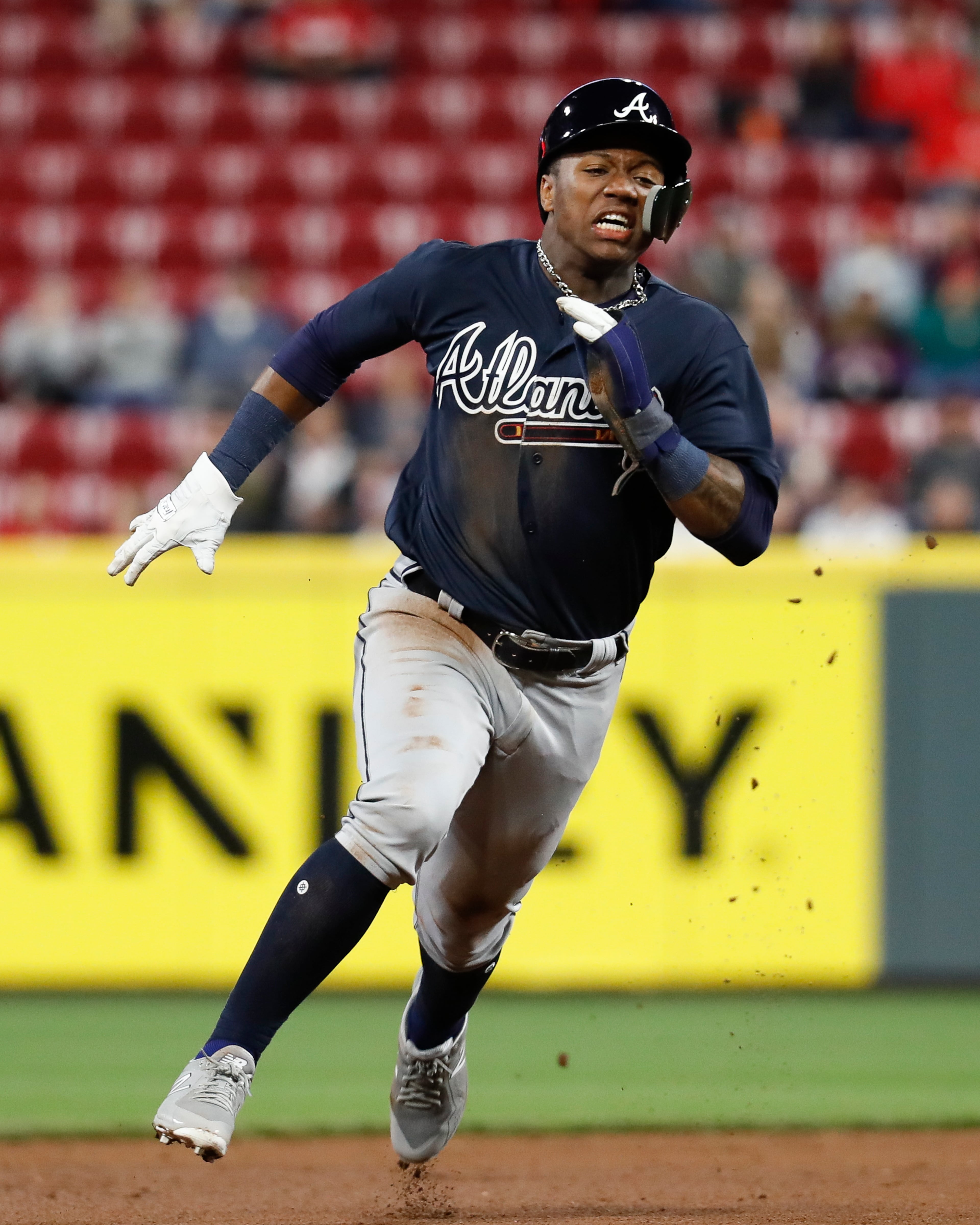 Atlanta Braves' Ronald Acuna Jr. advanced to third on a single by Dansby Swanson during the eighth inning of a baseball game against the Cincinnati Reds on Wednesday, April 25, 2018, in Cincinnati. (AP Photo/John Minchillo)