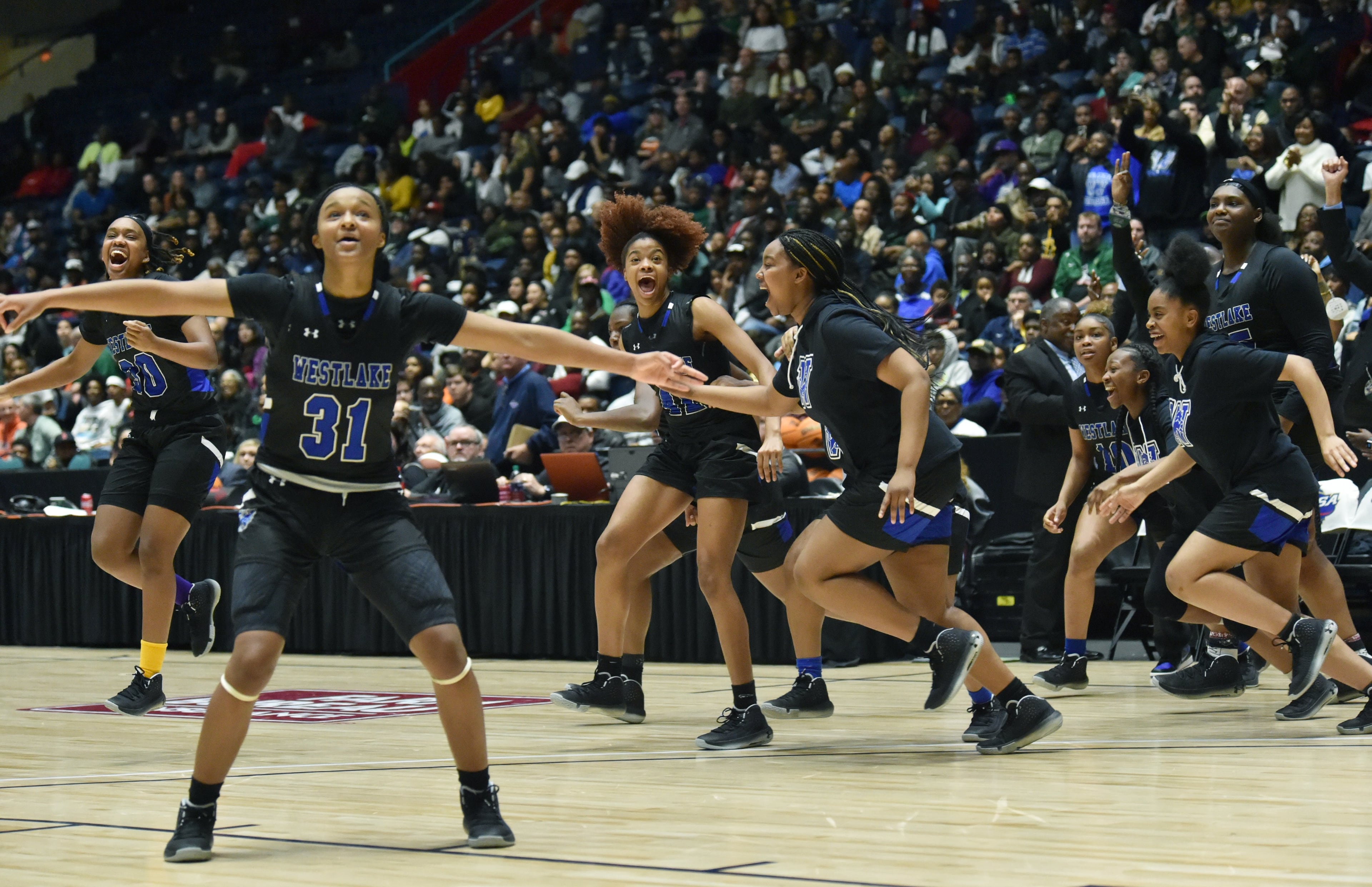 Westlake players celebrate their victory during 2020 GHSA State Basketball Class Championship game at the Macon Centreplex in Macon on Saturday, March 7, 2020. Westlake won 72-53 over Collins Hill. (Hyosub Shin / Hyosub.Shin@ajc.com)