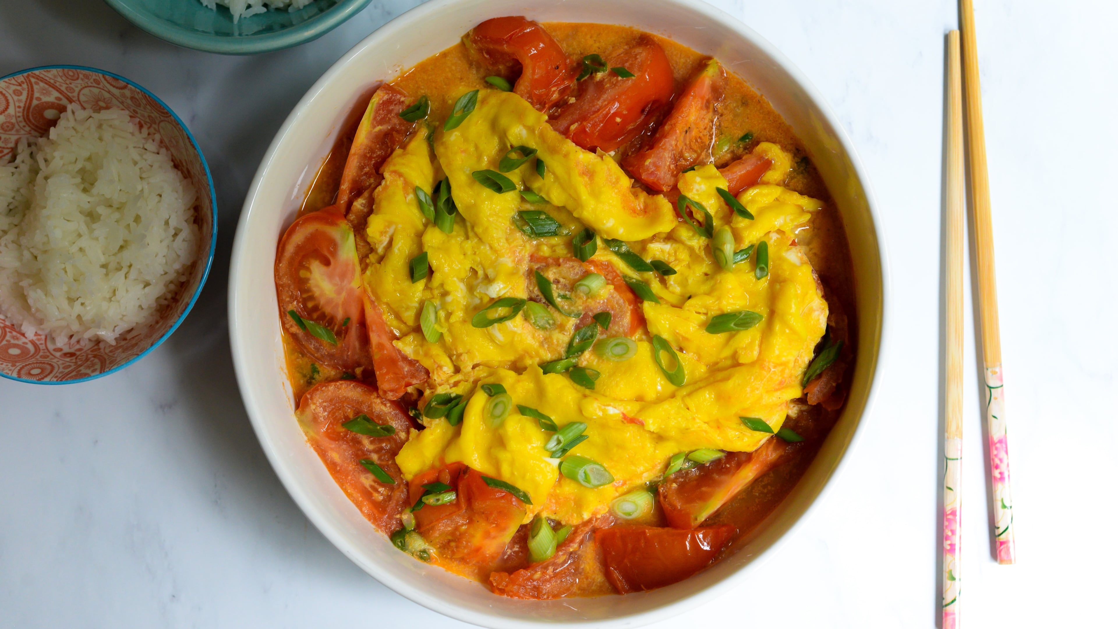 Tomato and Egg Stir-Fry is a delicious way to use garden-fresh tomatoes. (Candy Hom for the AJC)
