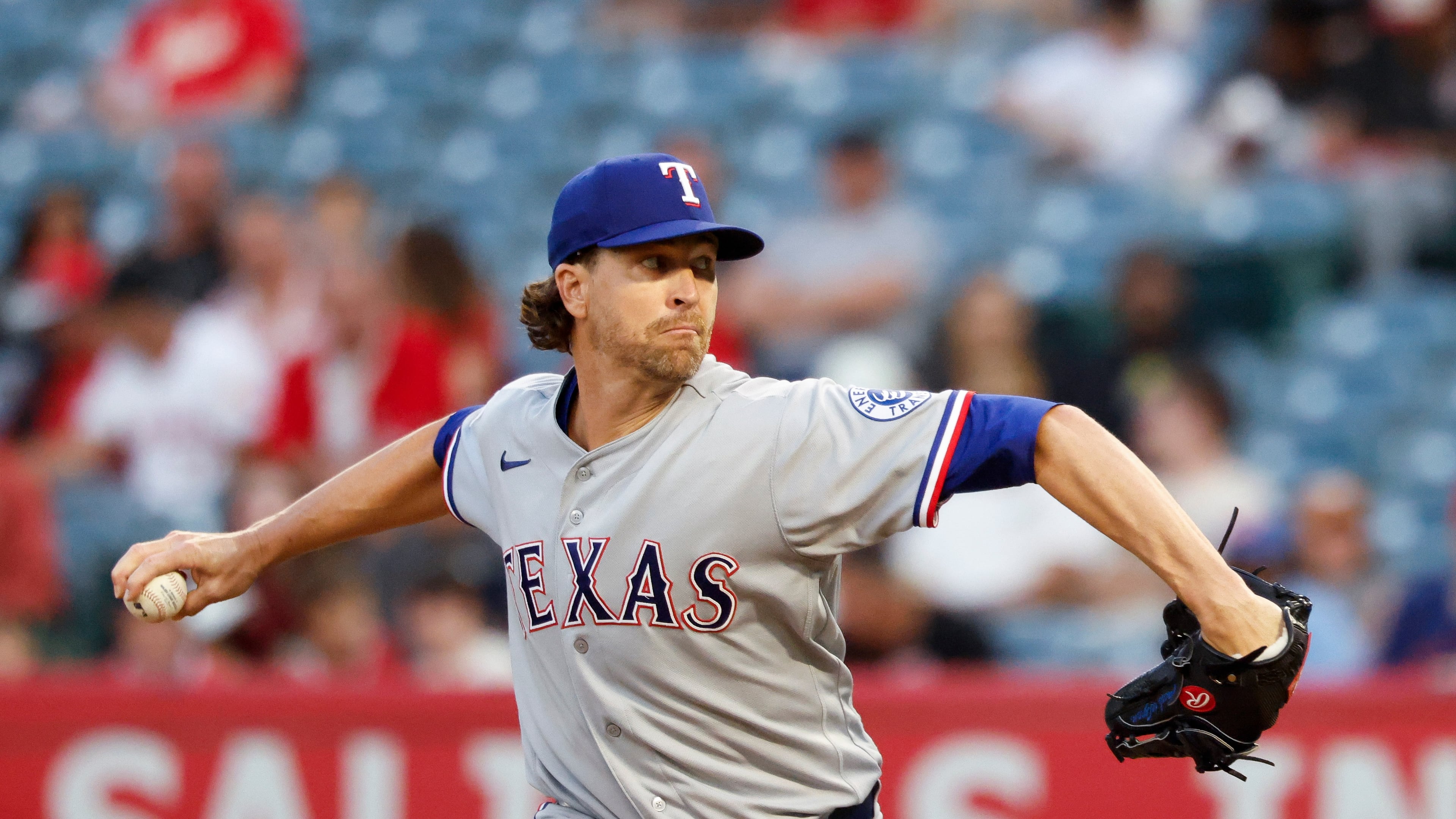 Texas Rangers starting pitcher Jacob Degrom (48) throws during the first inning of a baseball game against the Los Angeles Angels, Thursday, Aug. 13, 2026, in Anaheim, Calif. (AP Photo/Caroline Brehman)