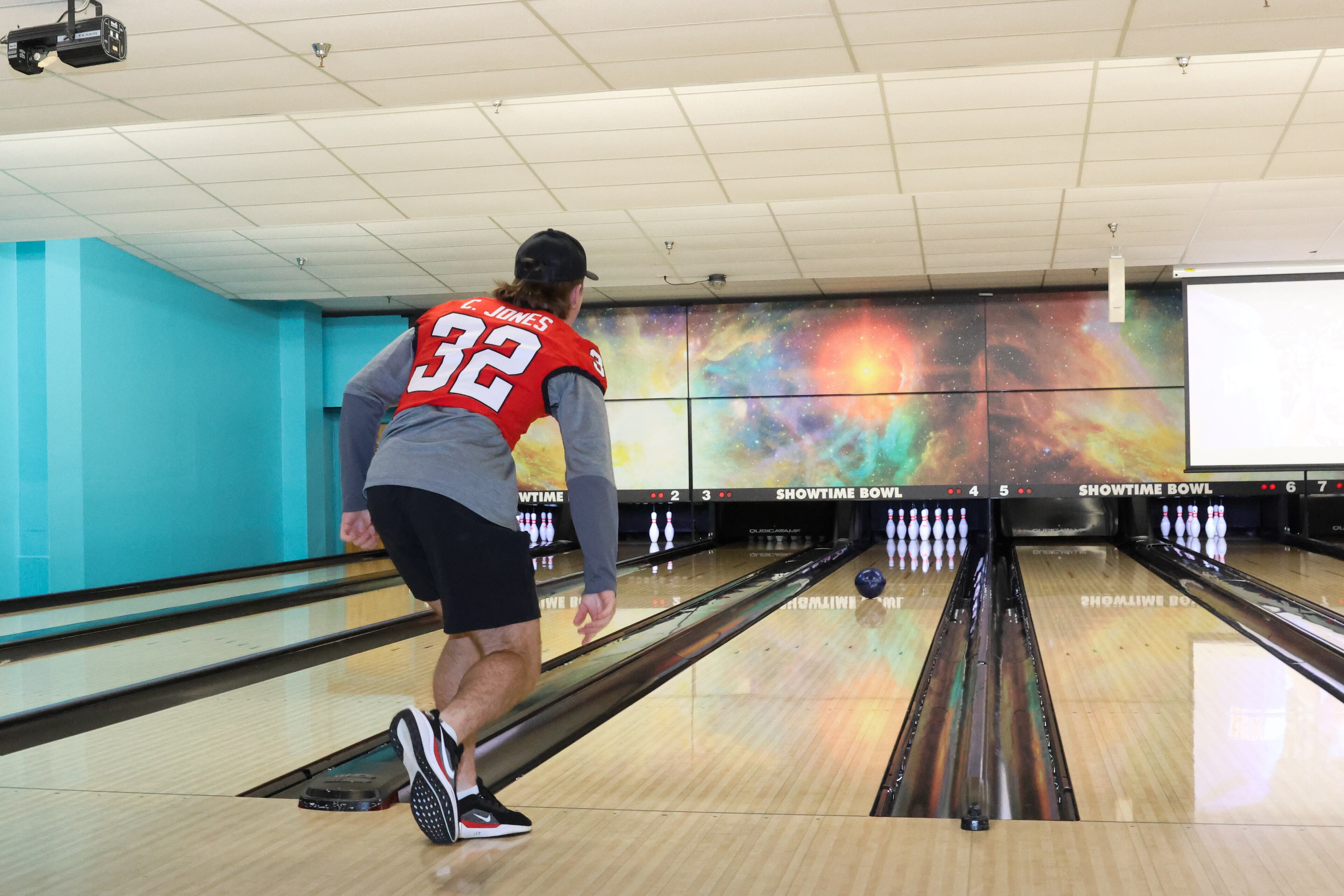 UGA running back Cash Jones bowls during the third annual Chick-fil-A Dawg Bowl fundraiser for Parkinson’s and Crohn’s disease research at Showtime Bowl in Athens on Wednesday, Oct. 22, 2025. (C.J. Bartunek for the AJC)